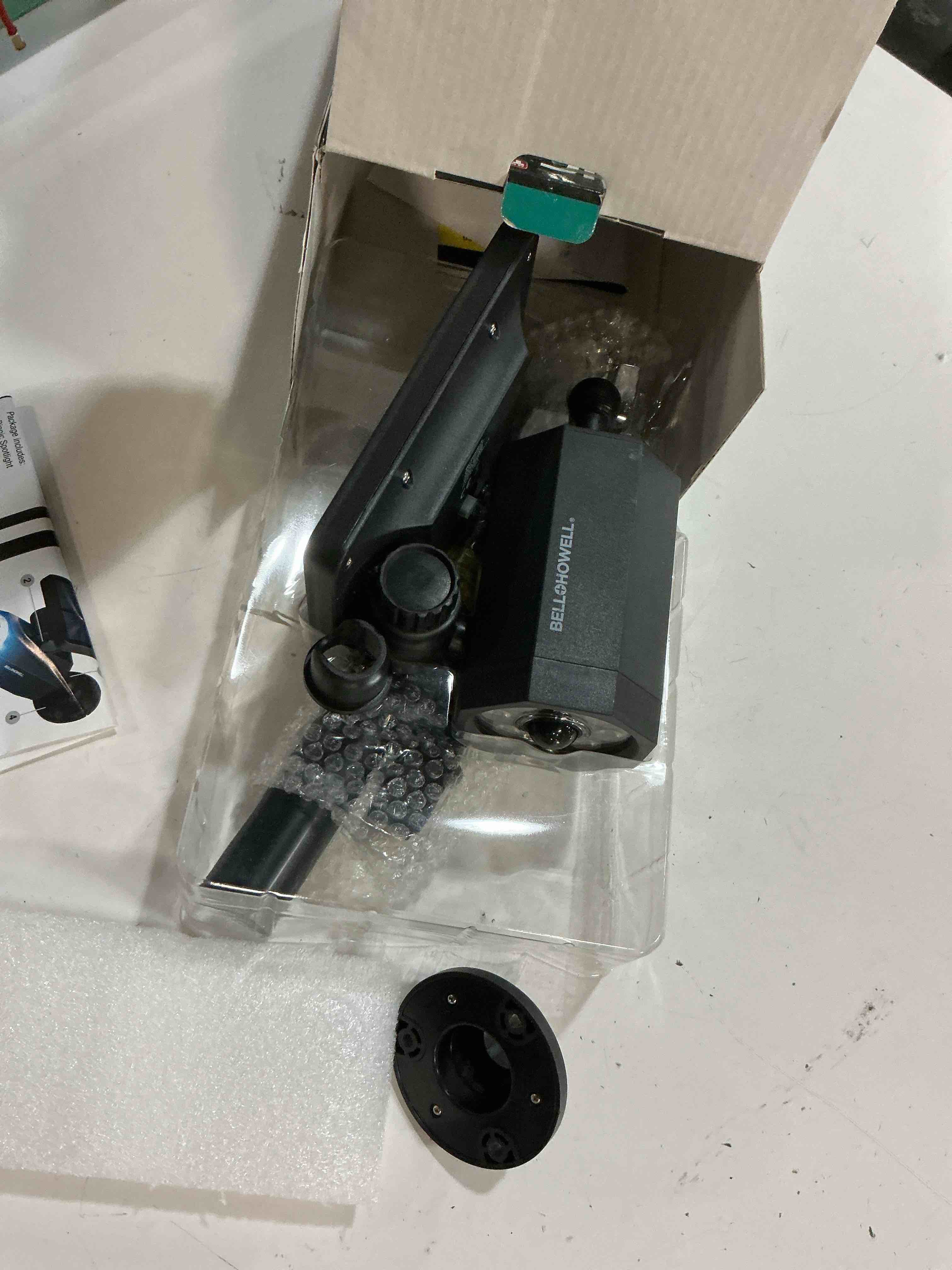 Condition photo showing As Is for bell + howell bionic spotlight  25 ft. motion sensor  solar sun panels  outdoor lighting- black