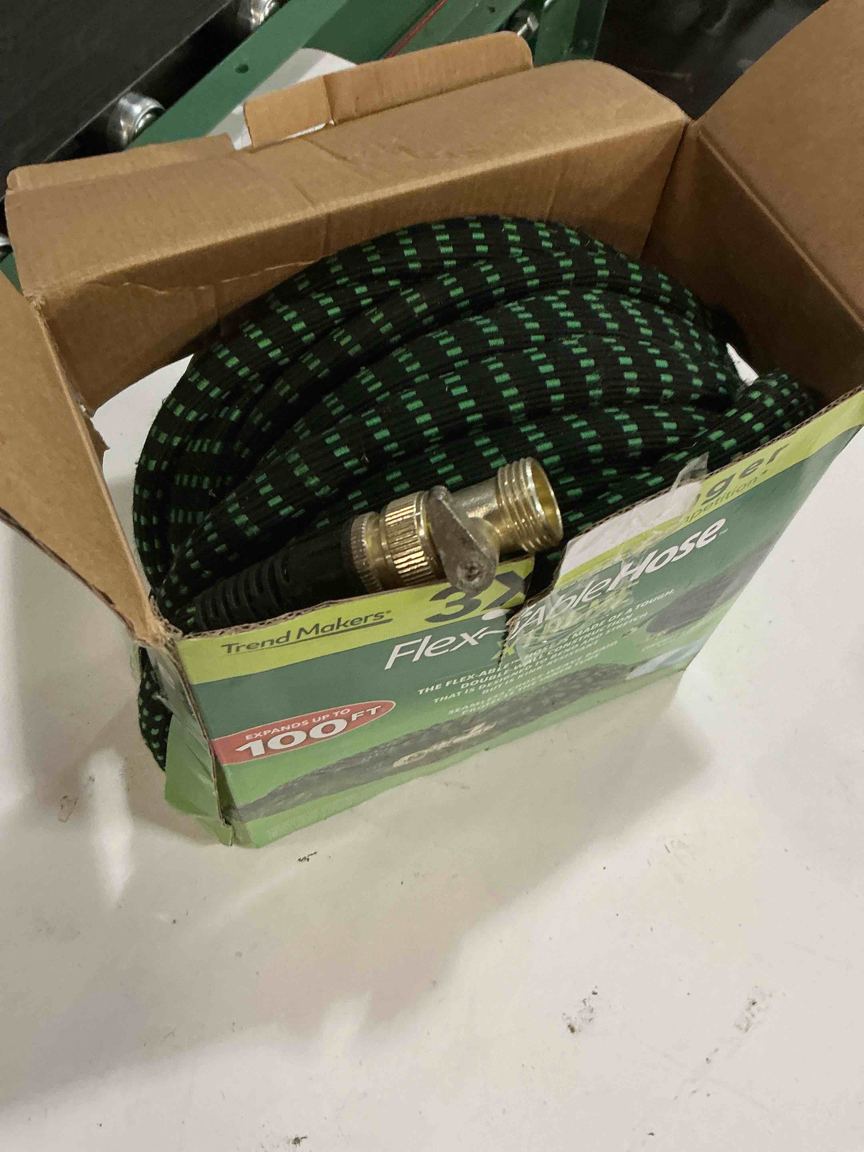 Condition photo showing As Is for flex-able hose xtreme 1-in x 50-ft kink free woven green hose