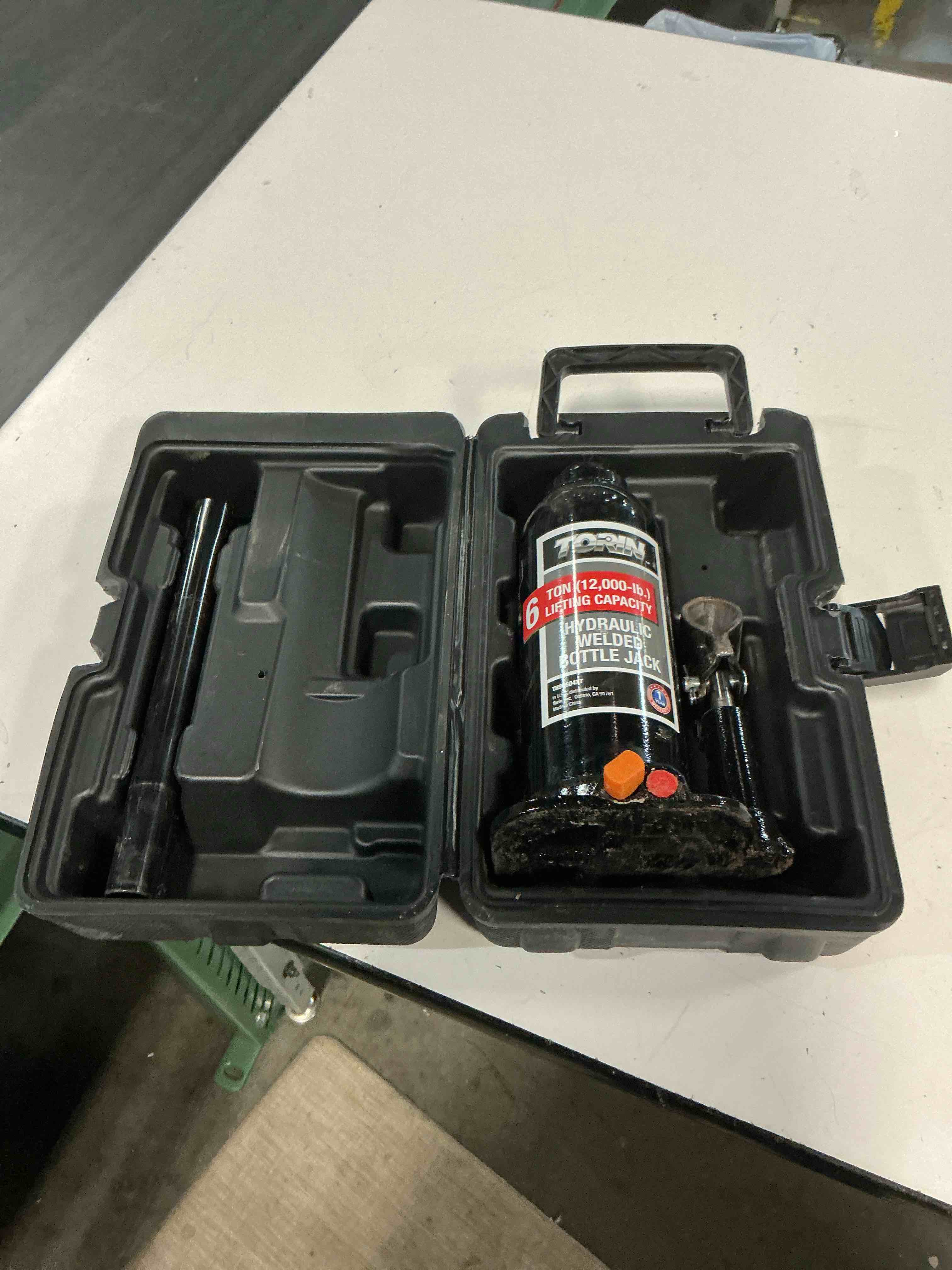 Condition photo showing As Is for torin black 6-ton steel hydraulic bottle jack 615268916040