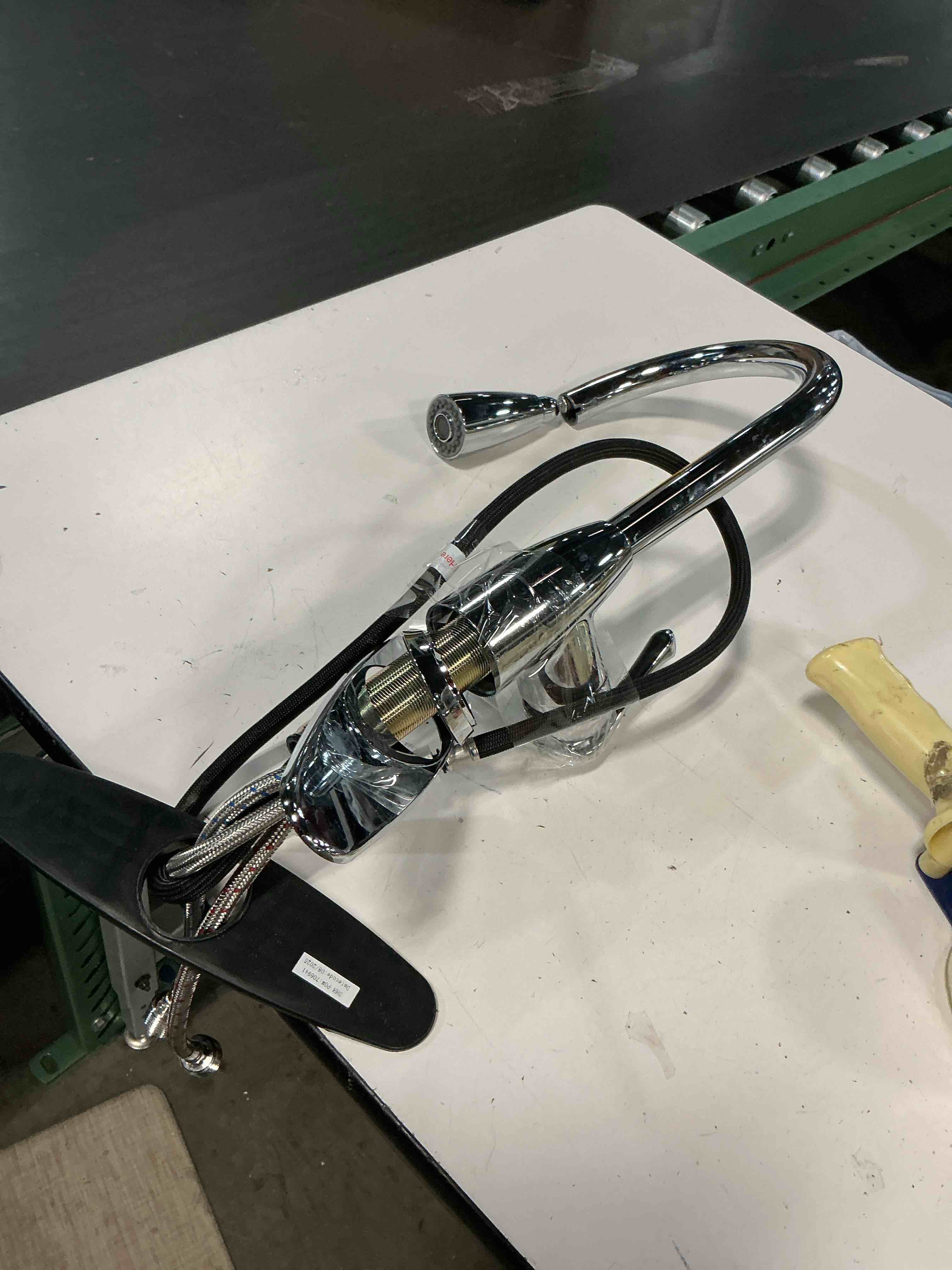 Condition photo showing As Is for project source tucker chrome single handle deck-mount pull-down kitchen faucet with sprayer (includes deck plate) 921987