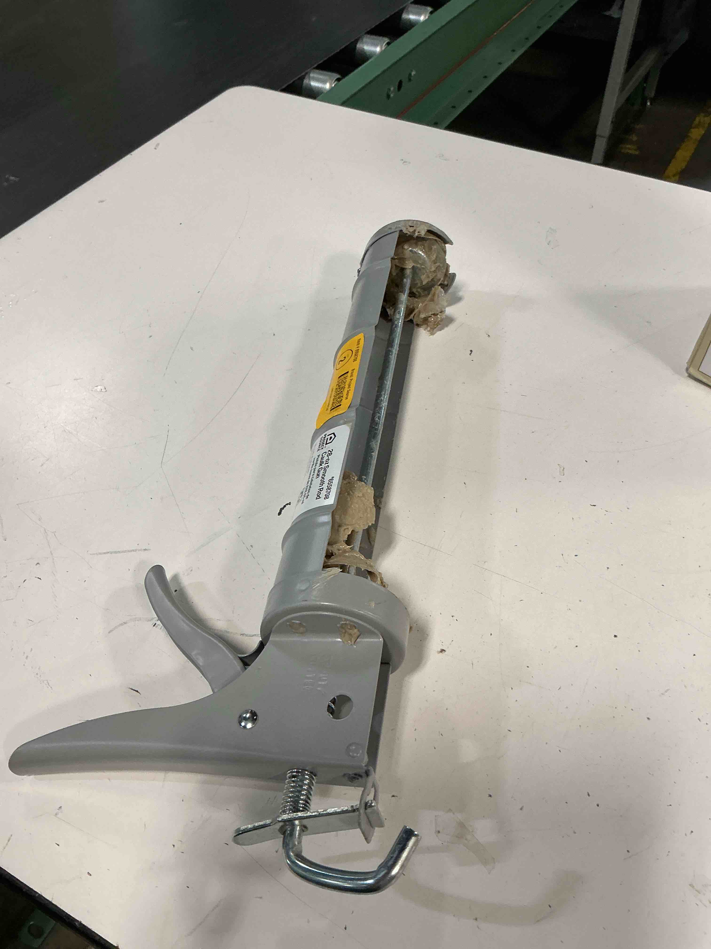 Condition photo showing As Is for project source caulk gun 6930372988276