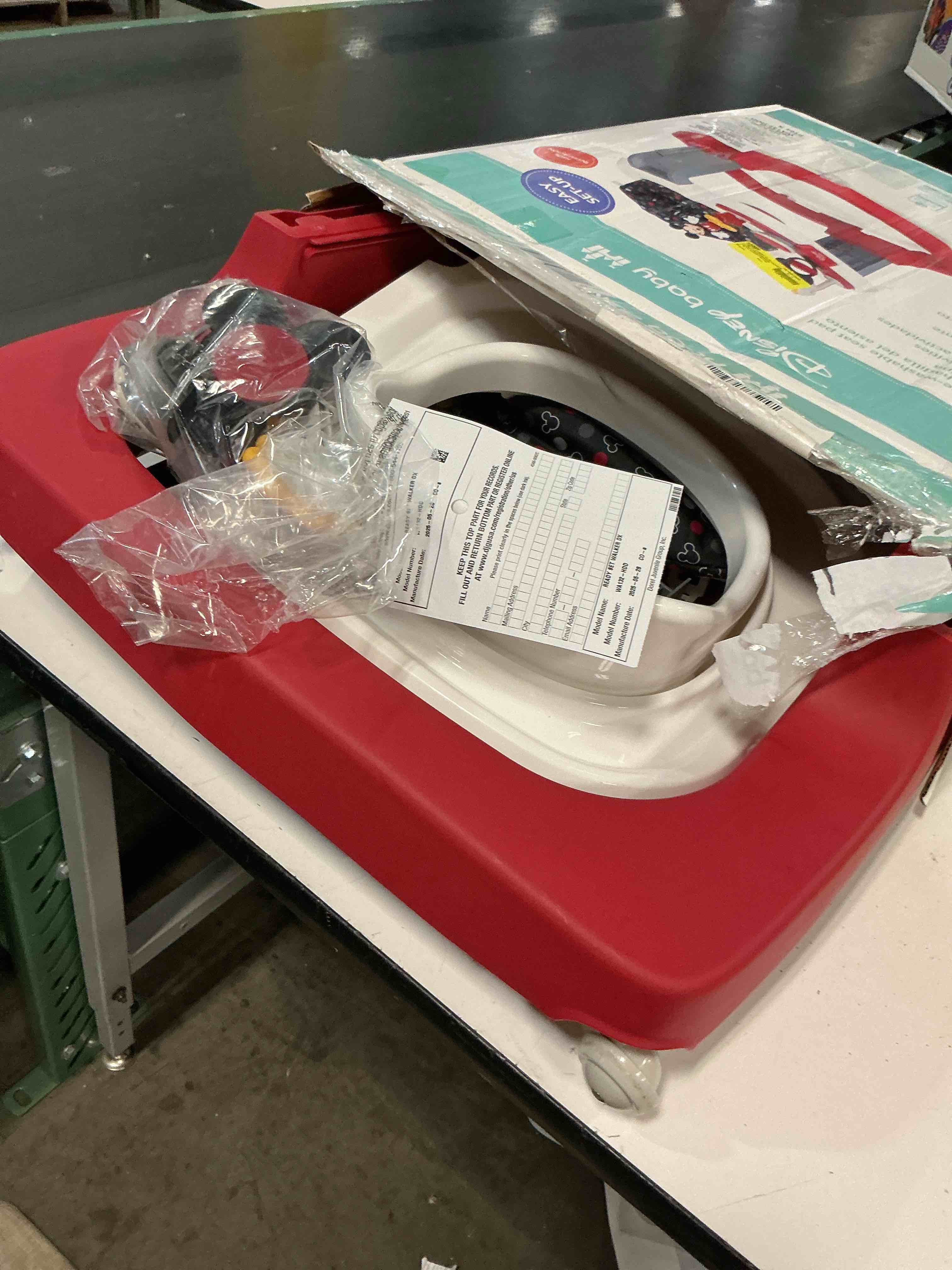 Condition photo showing Good Condition for model #wa132hdd ready, set, walk dx developmental walker modern mickey