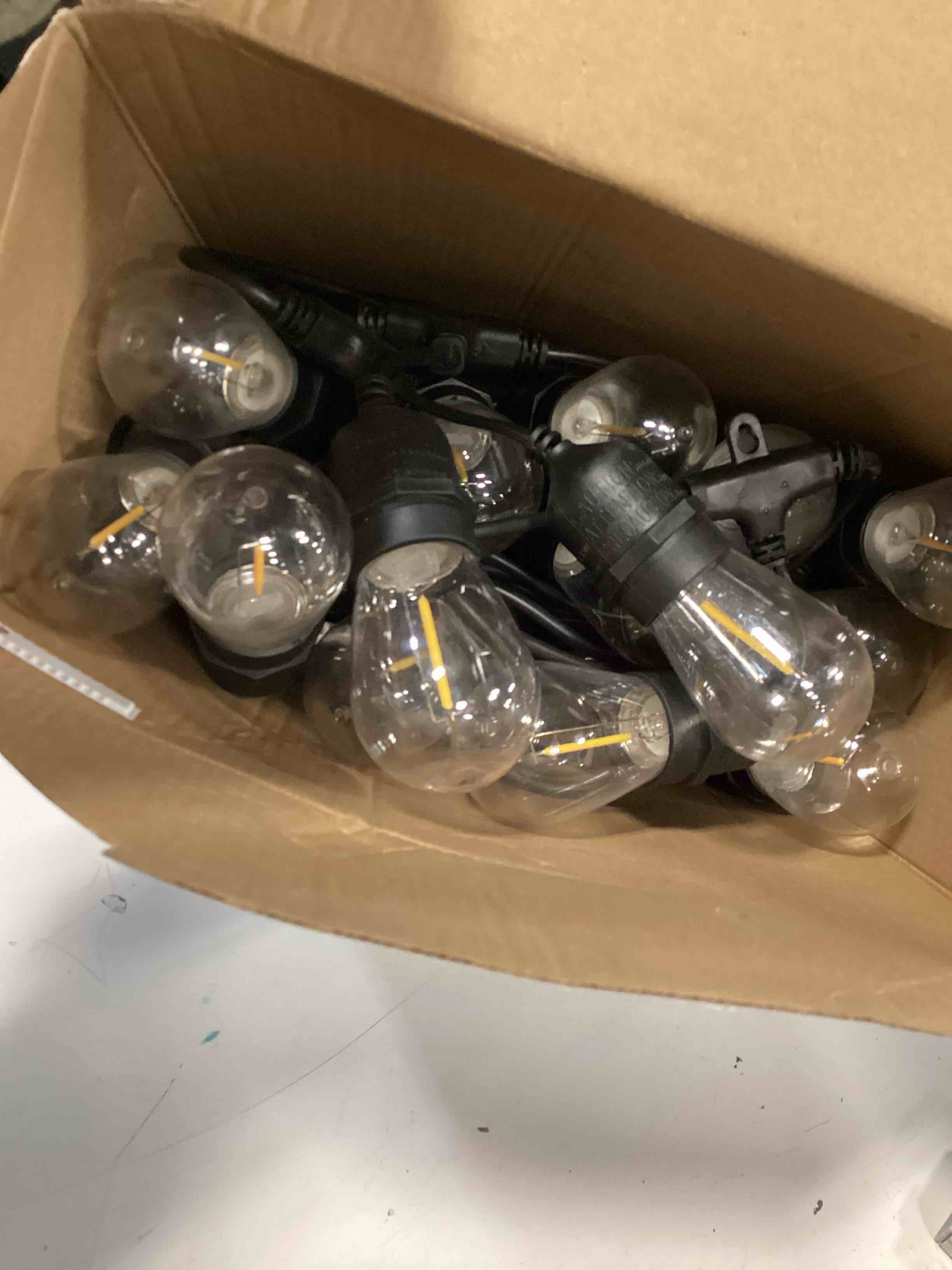 Condition photo showing As Is for harbor breeze 48-ft solar led string lights