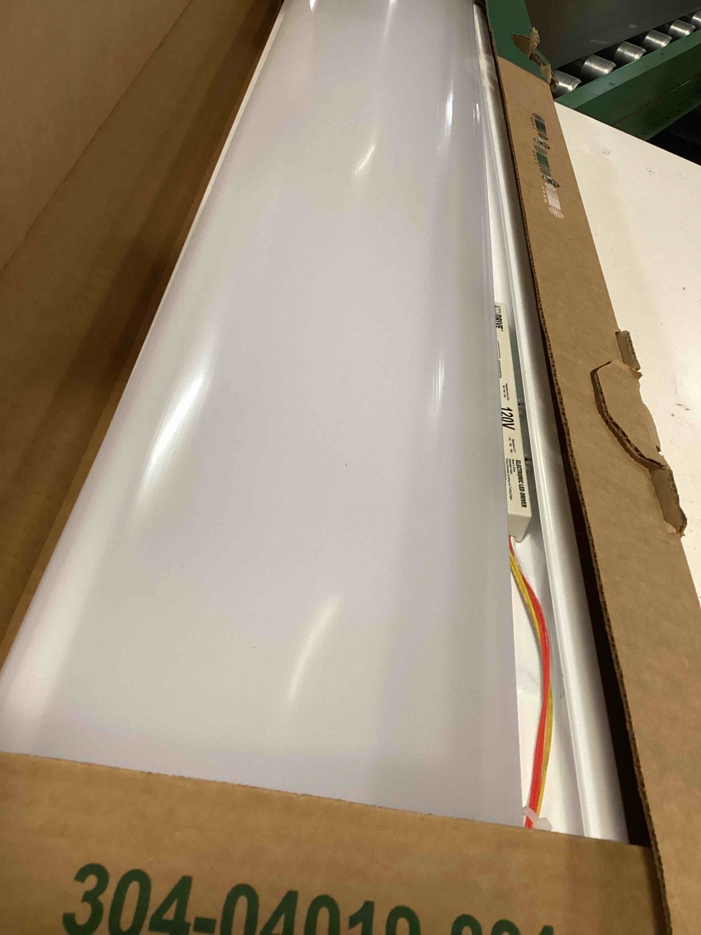 Condition photo showing As Is for lithonia lighting 4 ft. 4000/5000/6000 lumens integrated led triac dimming white wraparound light, switchable color temperature