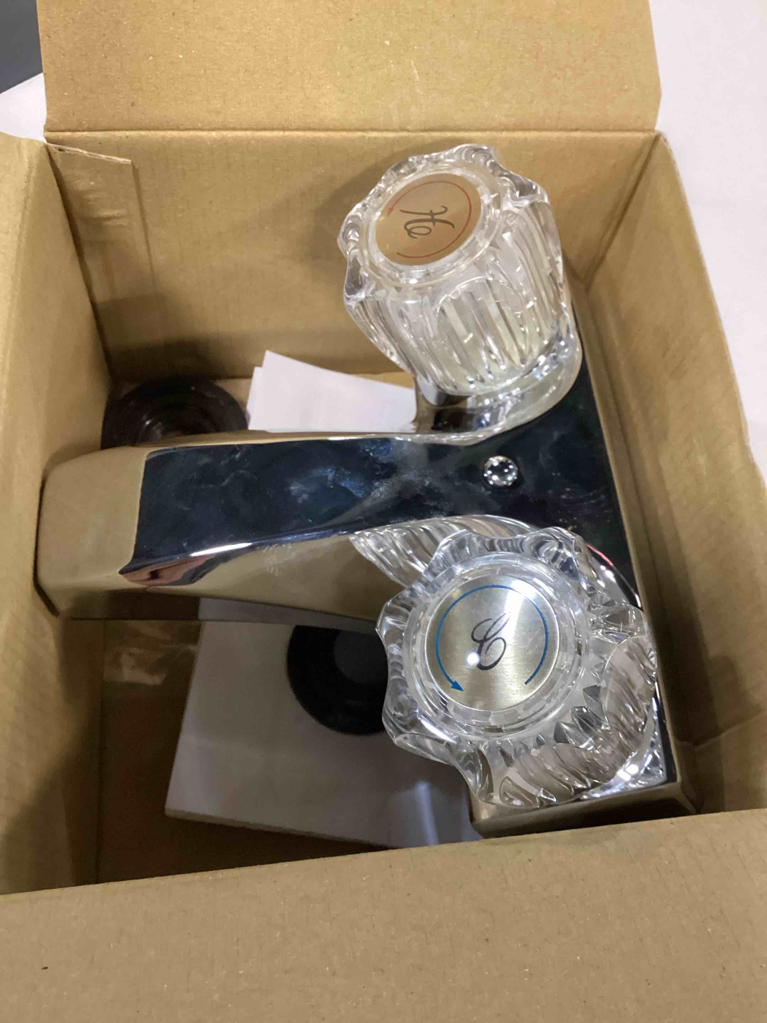 Condition photo showing As Is for non-metallic lavatory faucets chrome finish acrylic knobs #0935182 new