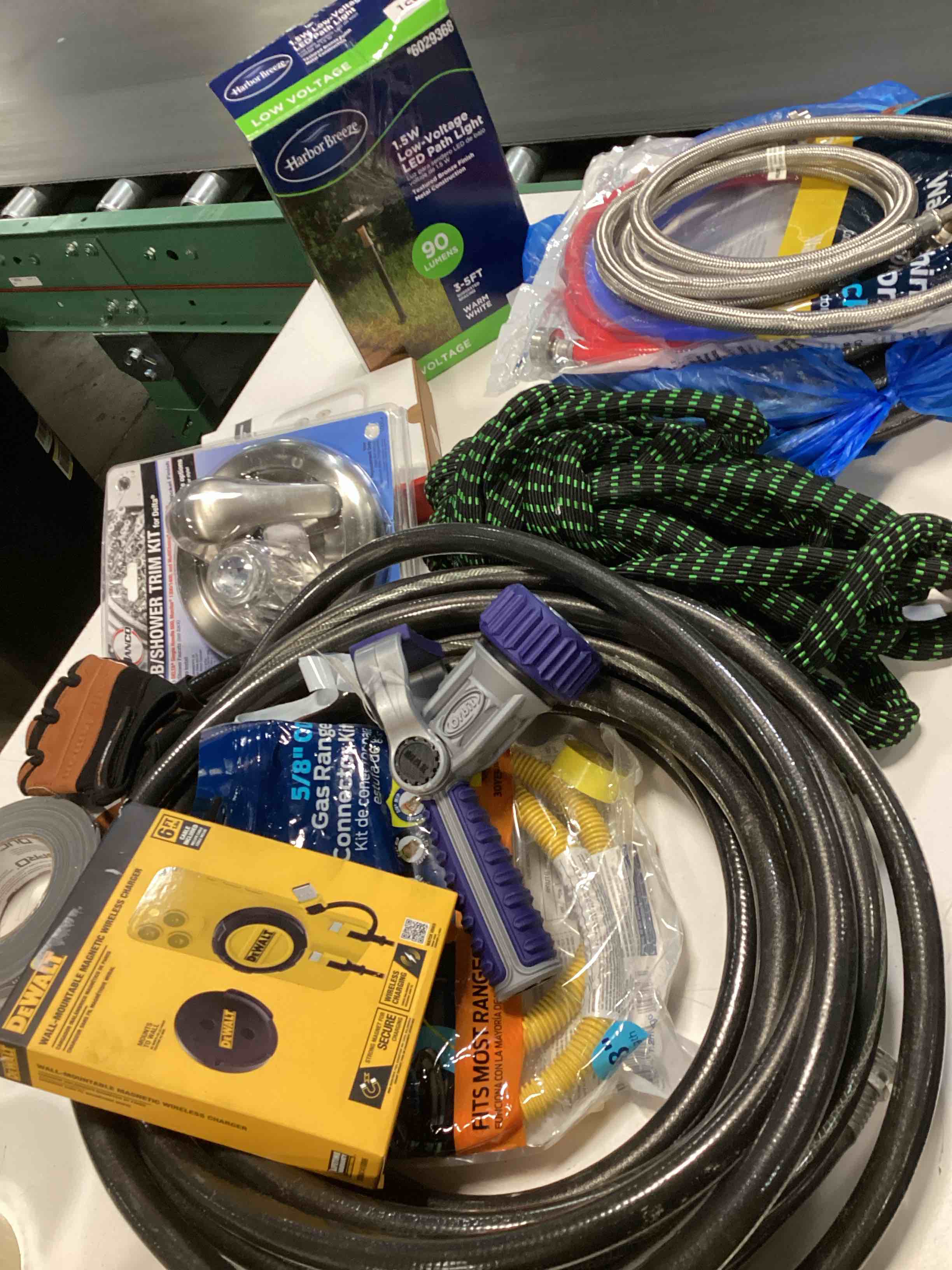 Condition photo showing As Is for assorted home improvement lot (small tools, screw, home accessories, etc.)