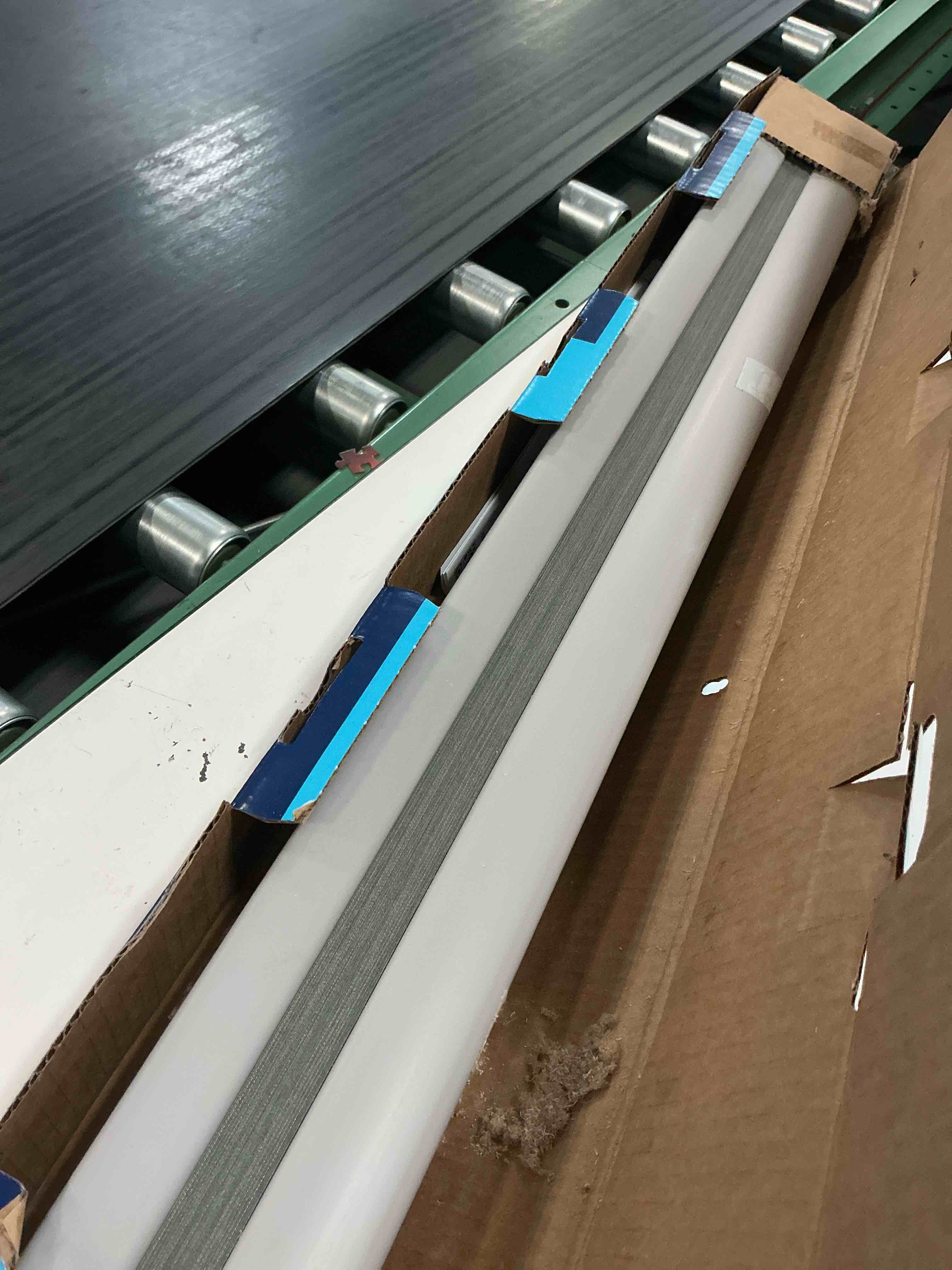 Condition photo showing As Is for levolor 36-in x 72-in graphite blackout cordless cellular shade