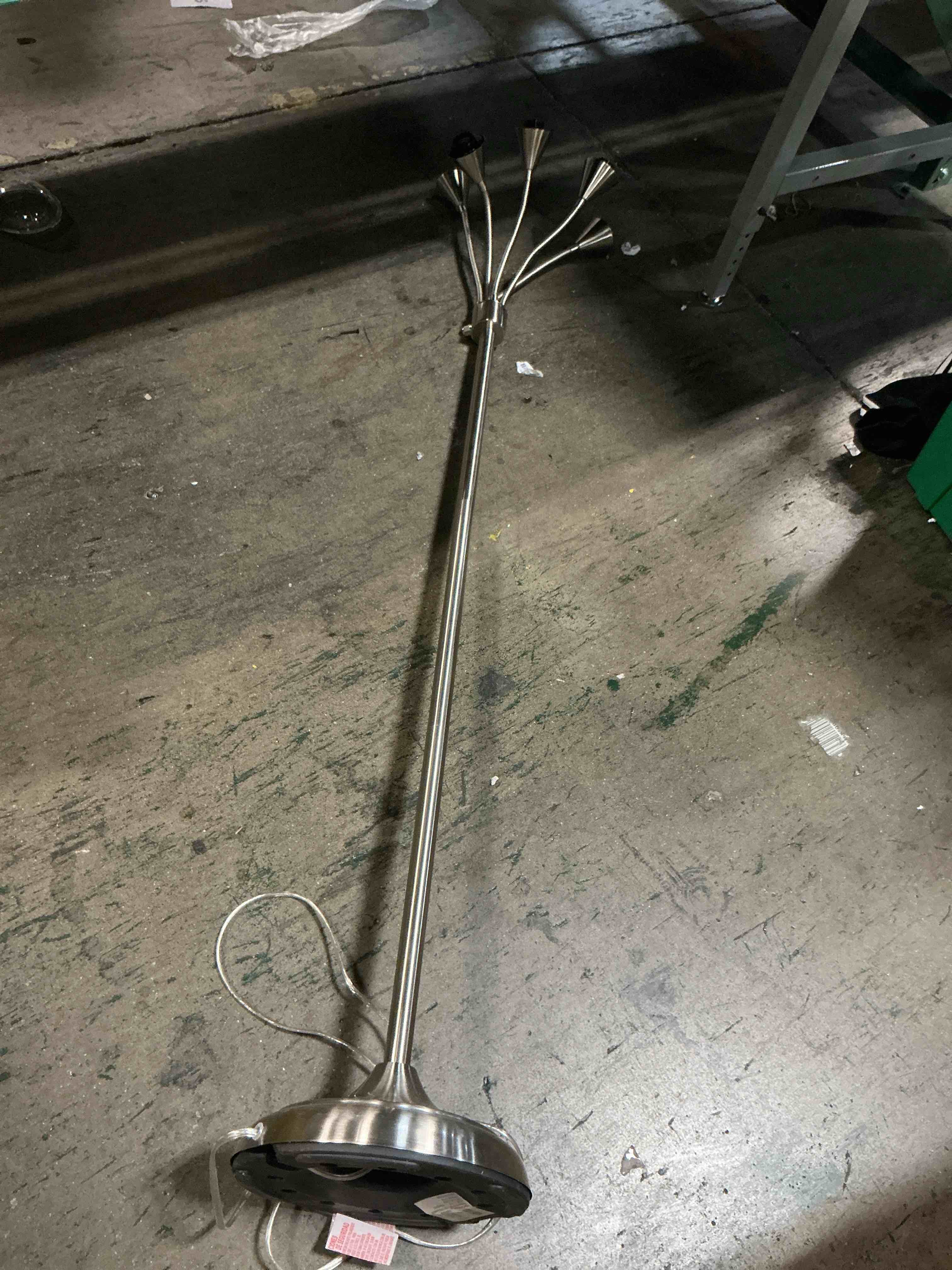 Condition photo showing As Is for style selections 67-in brushed steel multi-head floor lamp with plastic shade