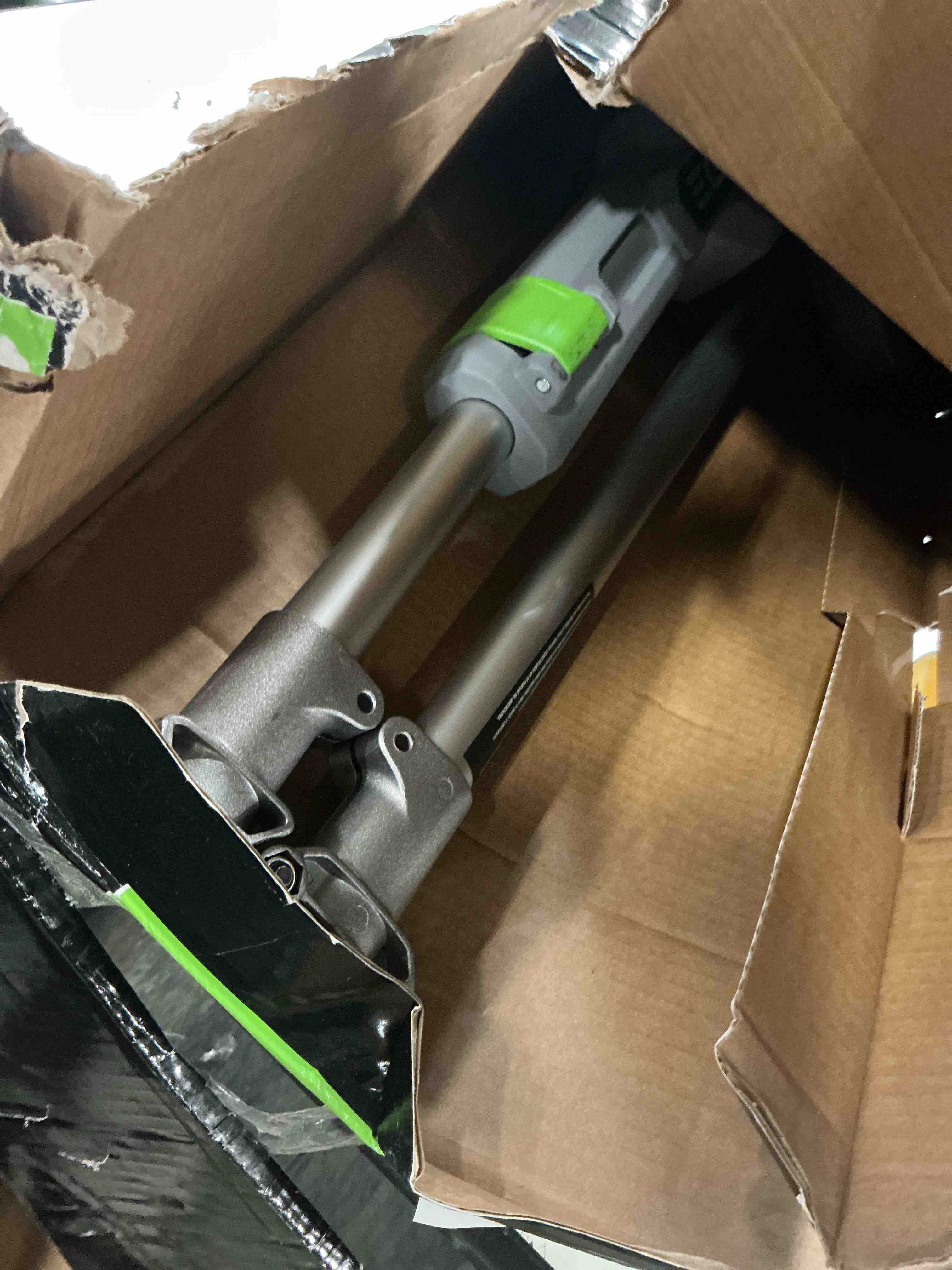 Condition photo showing As Is for ego st1511t 15-inch 56-volt lithium-ion cordless string trimmer kit alu foldable shaft battery and charger included, 15in powerload/telescopic/gauge(2.5ah), black