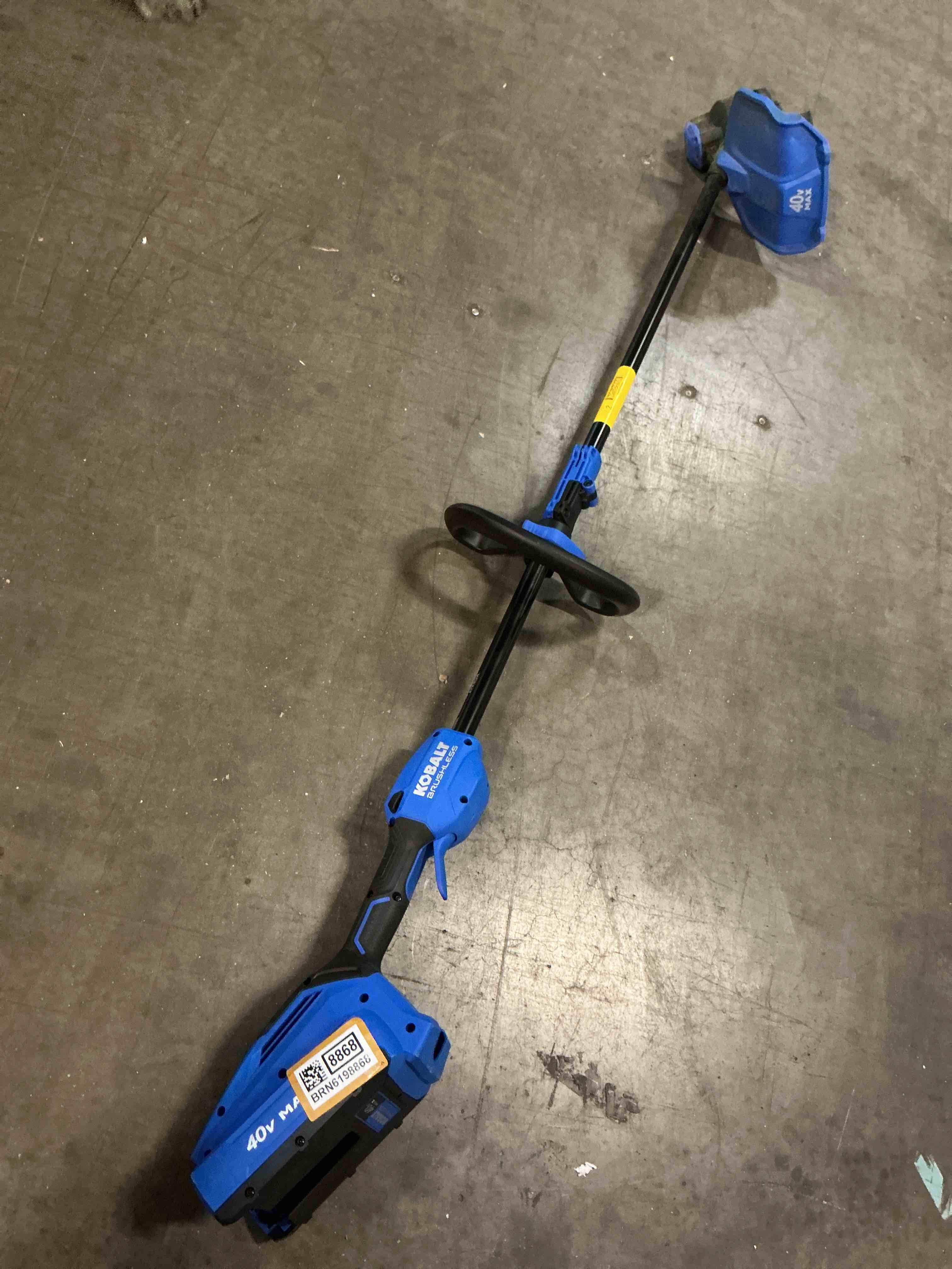 Condition photo showing As Is for kobalt gen4 40-volt 15-in straight shaft attachment capable battery string trimmer no include battery
