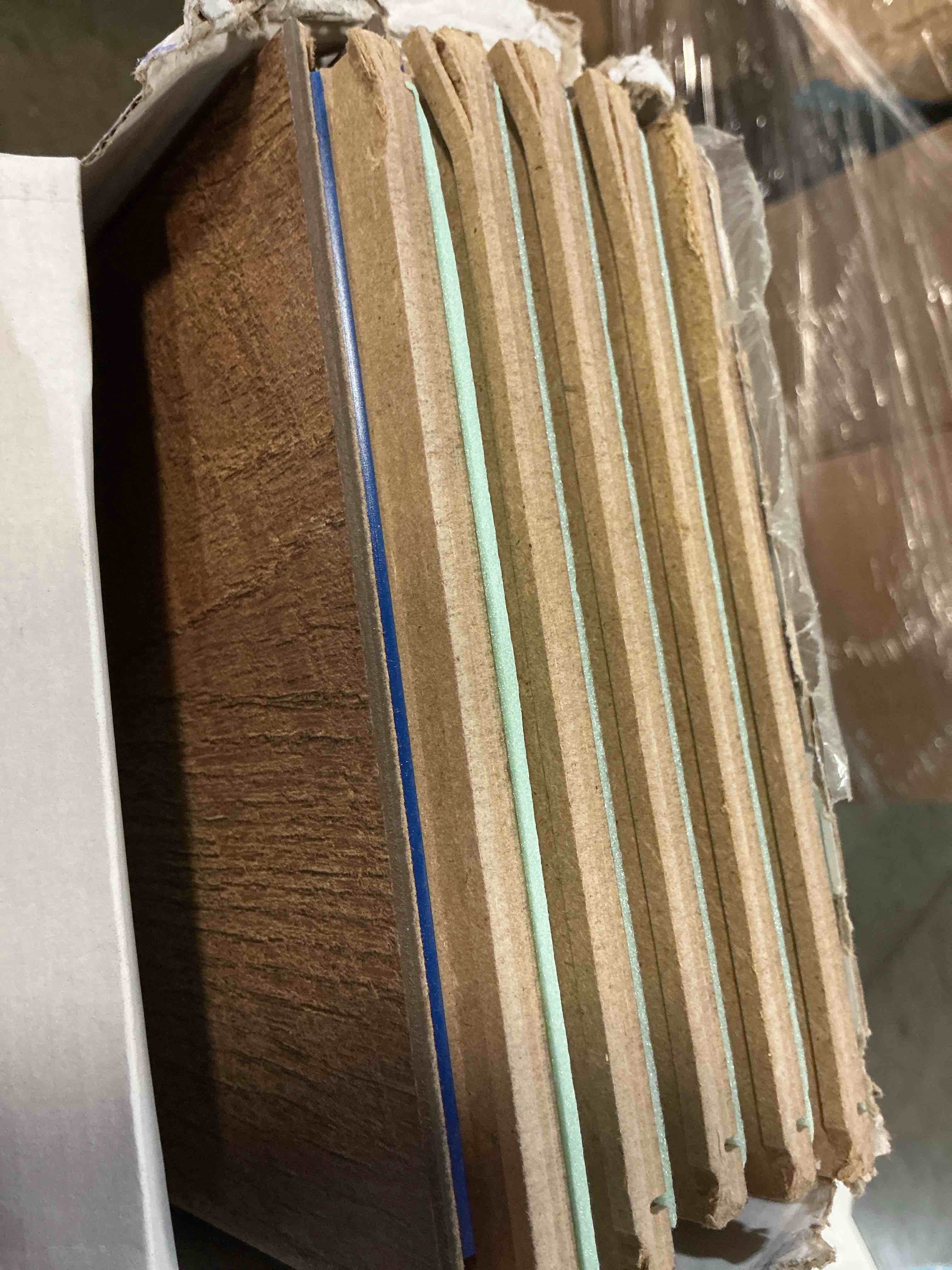 Condition photo showing As Is for select surfaces sclmf0486 barnwood spill defense laminate flooring 5 pcs