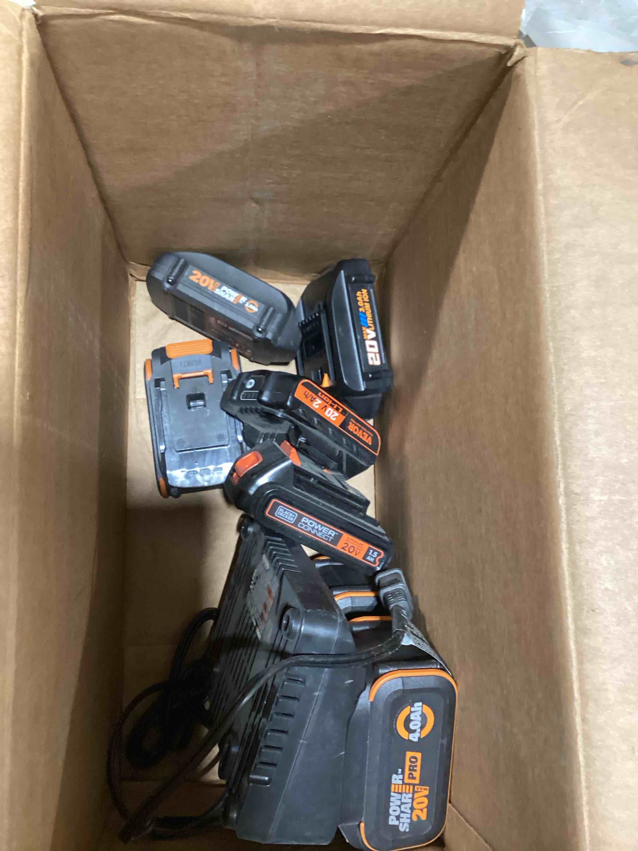 Condition photo showing As Is for worx/vevor lithium batteries, 1 worx battery charger (untested)