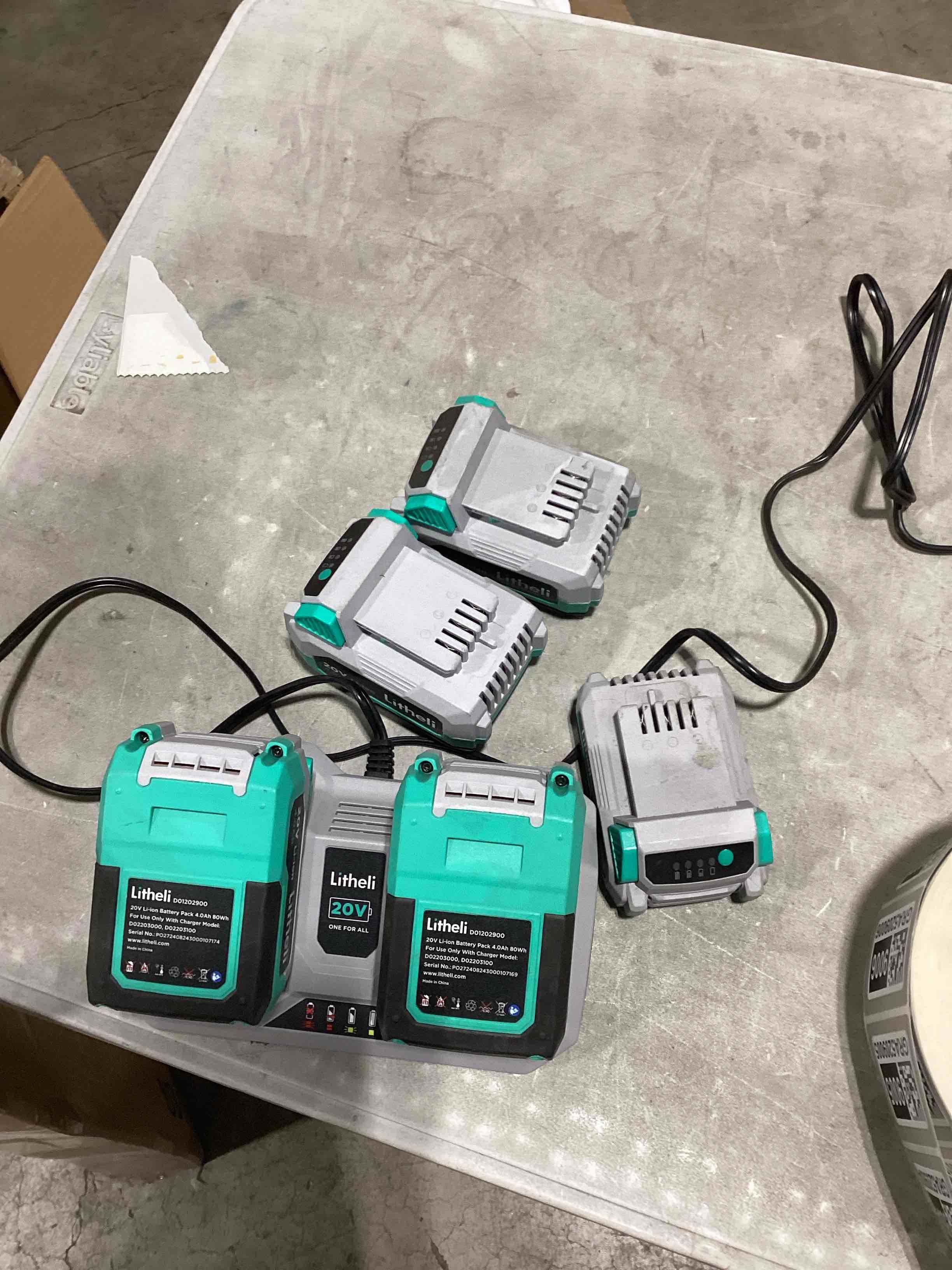 Condition photo showing As Is for litheli 20v lithium ion battery packs with charger (untested)