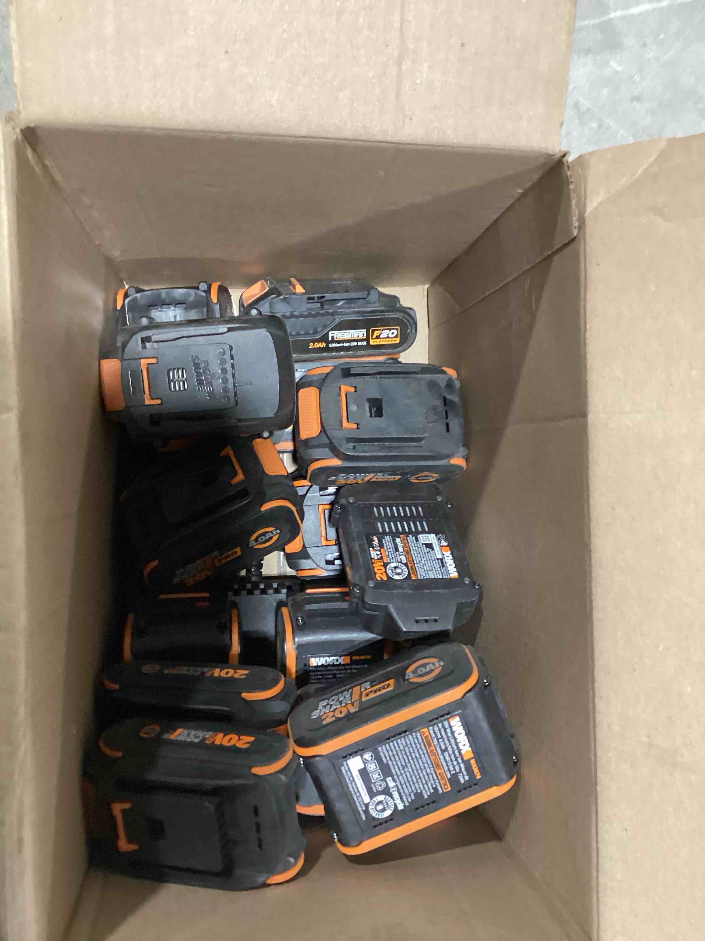 Condition photo showing As Is for various worx lithium batteries and charger (untested)