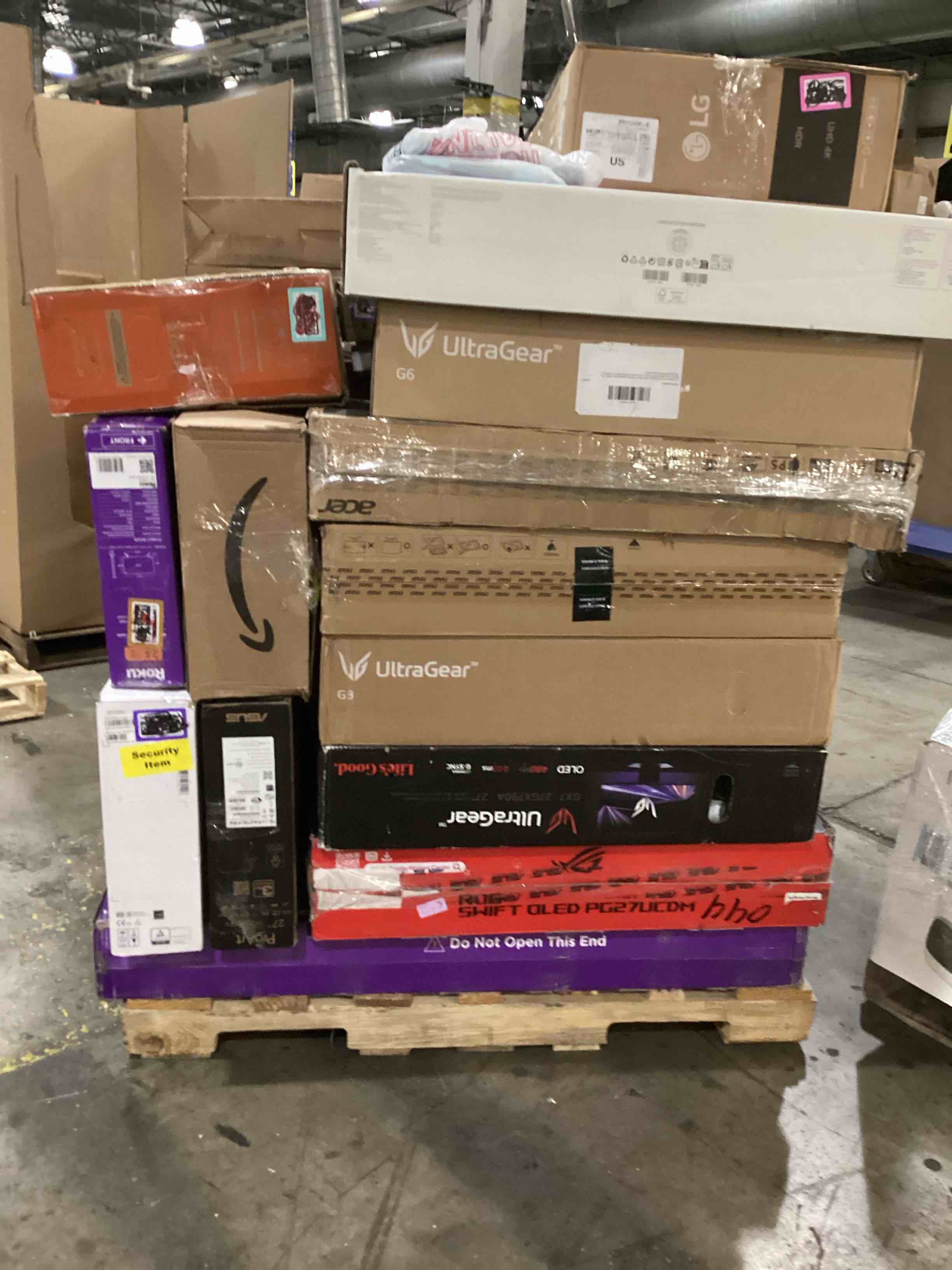 pallet of defective electronics for parts
