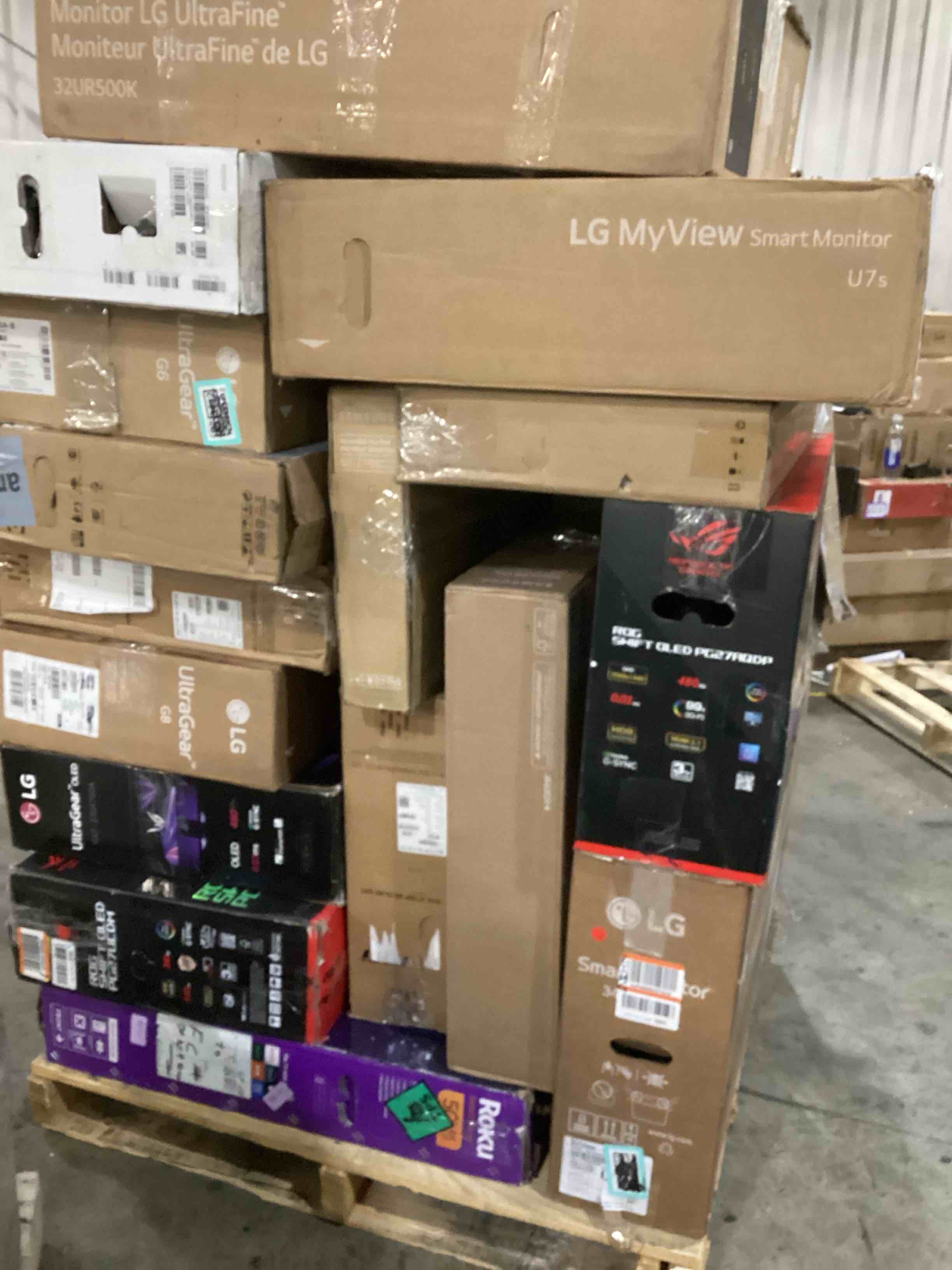 Condition photo showing As Is for pallet of defective electronics for parts