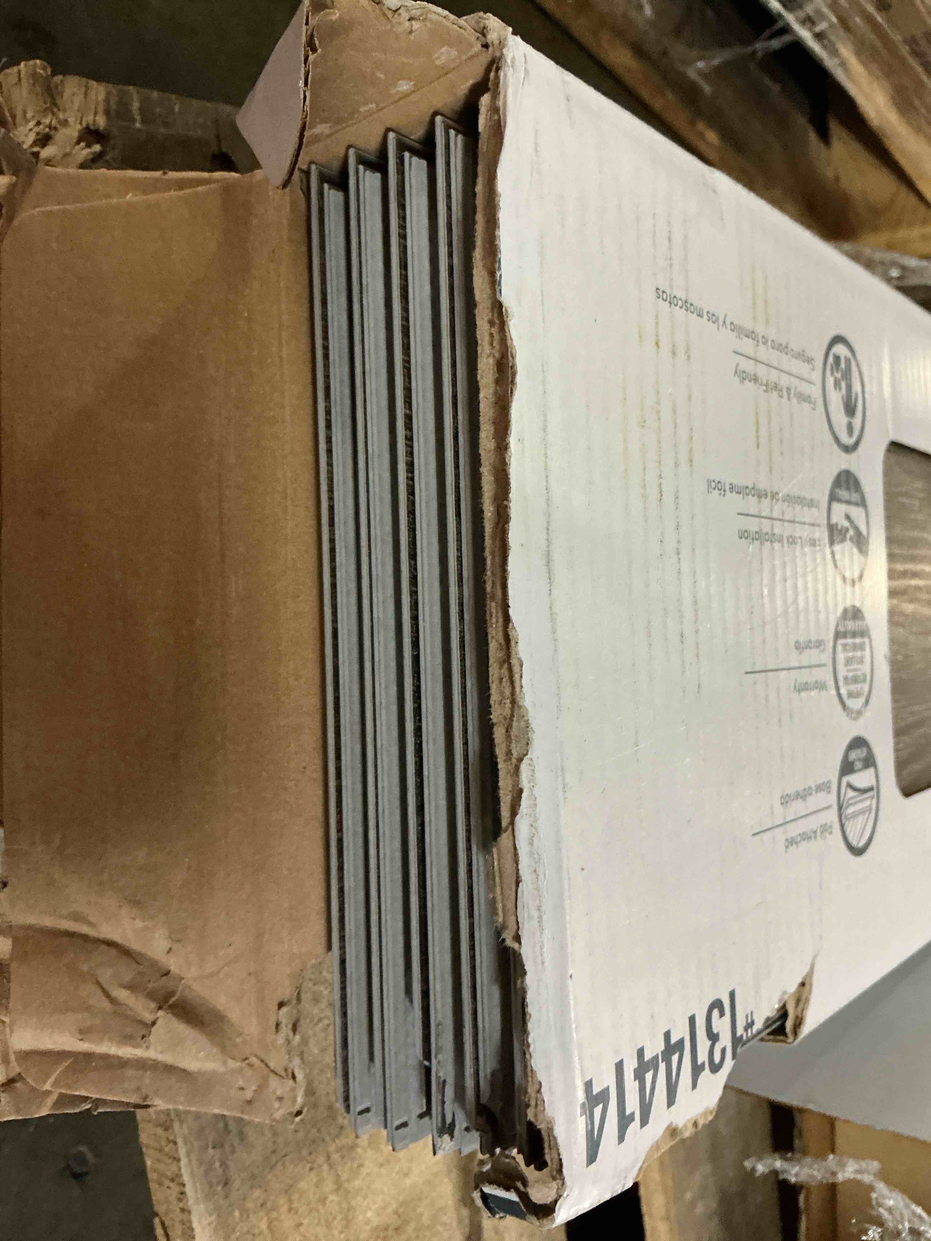 Condition photo showing As Is for 10k+ bought last week style selections tudor oak 12-mil x 7-in w x 48-in l waterproof luxury vinyl plank flooring