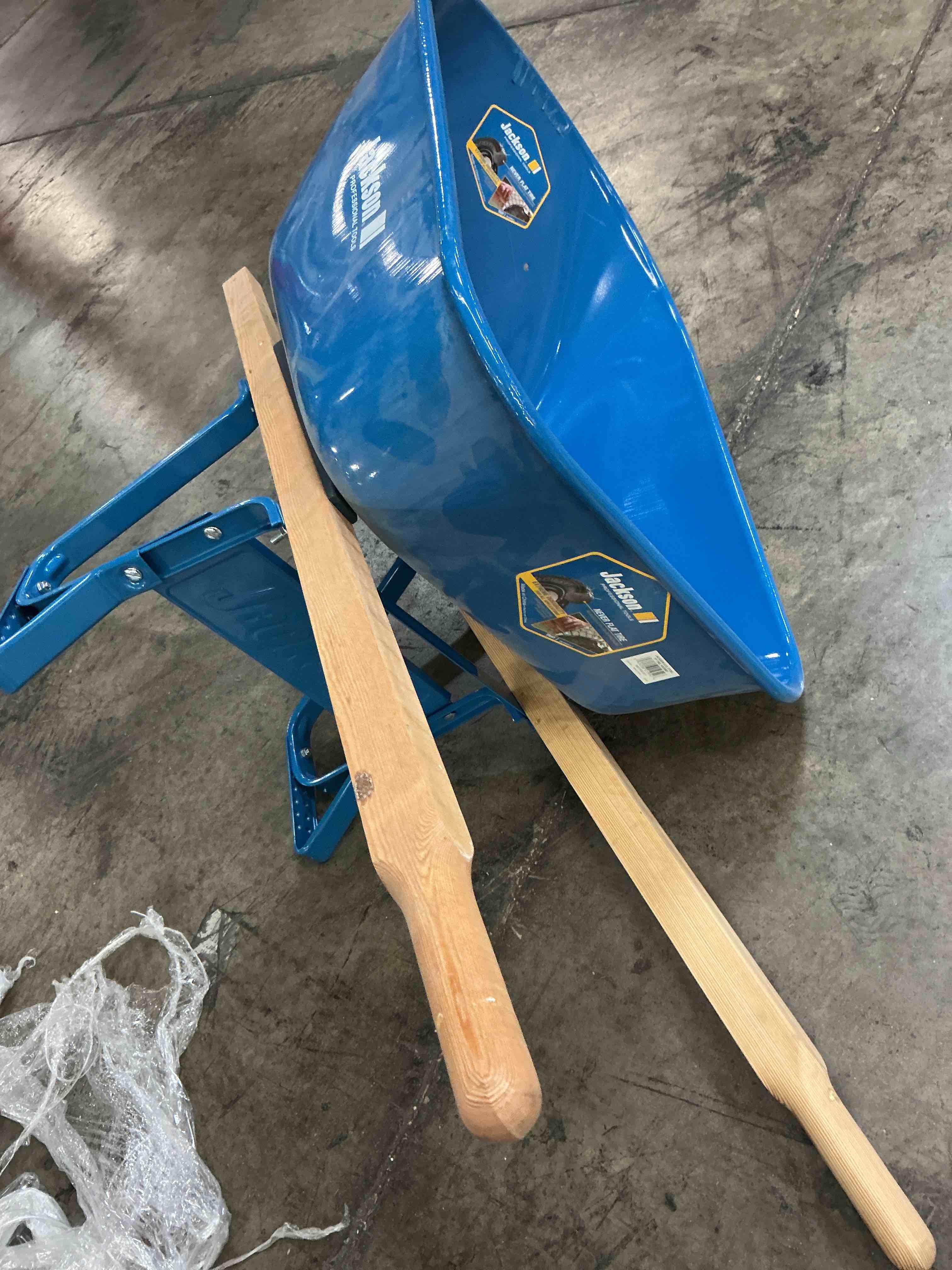 Condition photo showing As Is for jackson 6-cu ft steel wheelbarrow flat-free tire