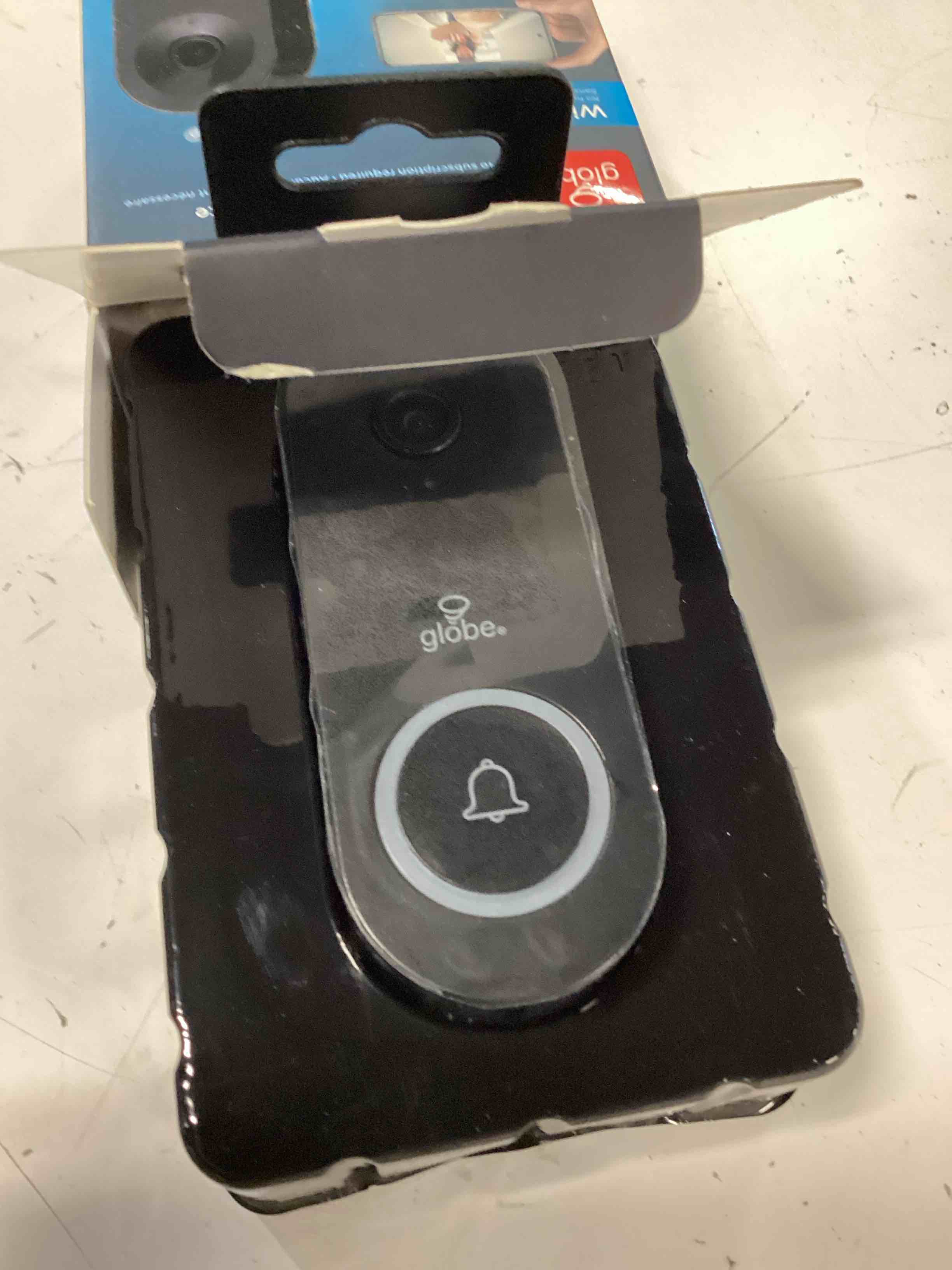 Condition photo showing As Is for black plastic wired smart video doorbell