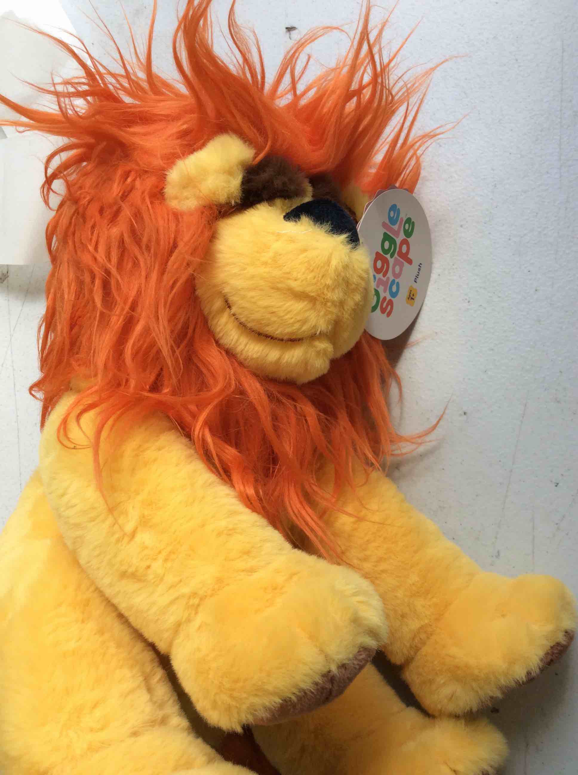 Condition photo showing New/Like New for giggle scape lion