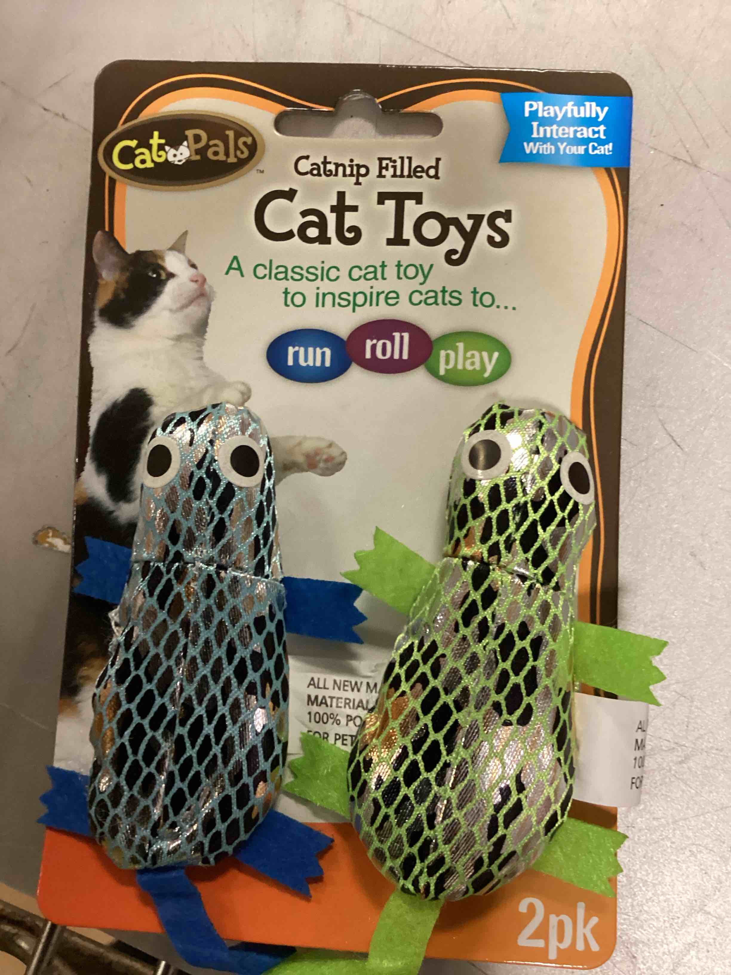 2-pack of Cat Pals catnip-filled frog toys featuring textured metallic fabric bodies and felt legs.