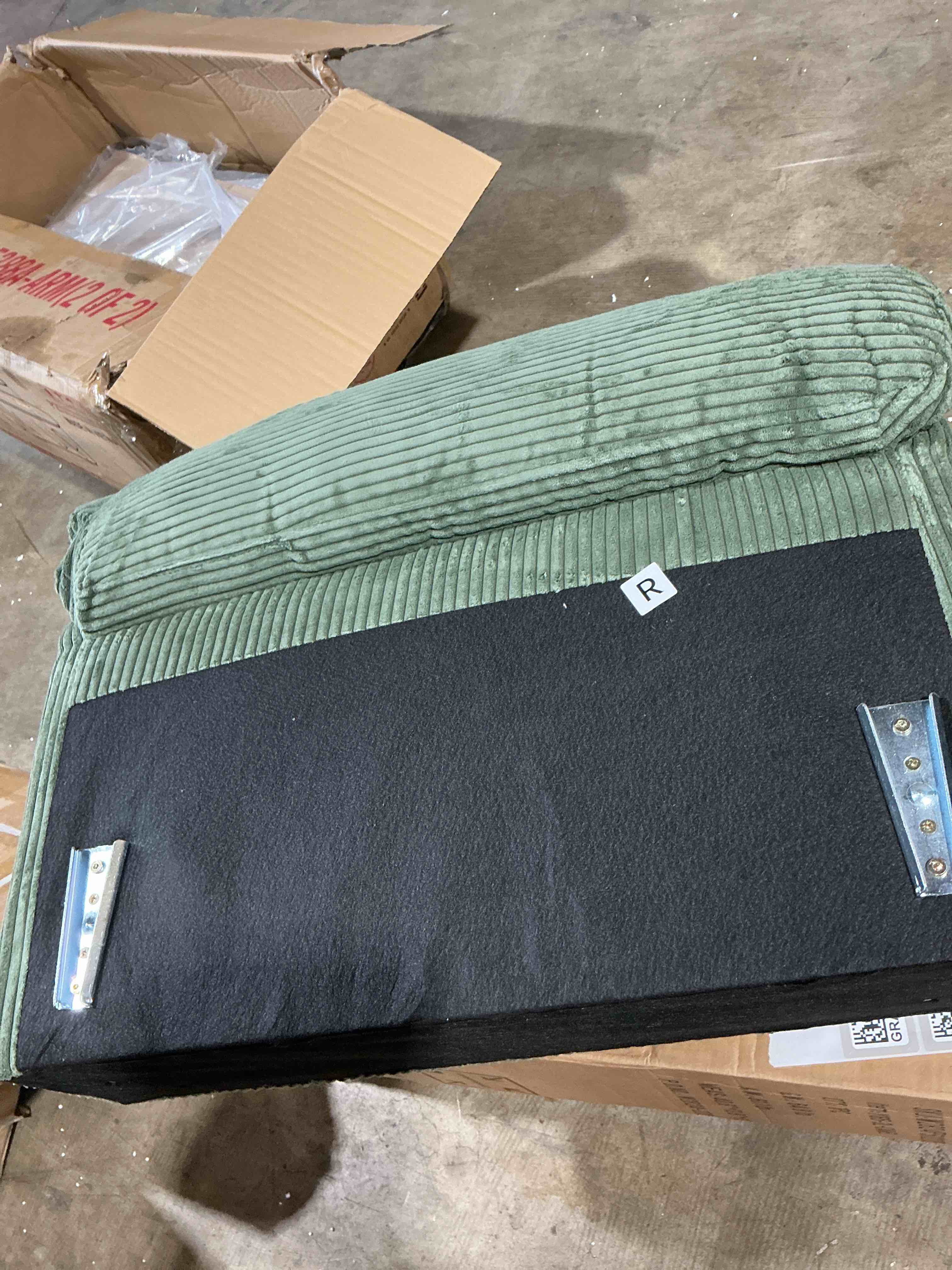 Condition photo showing Good Condition for 90'' w green green corduroy cloud sofa and couch( sofa arms only)