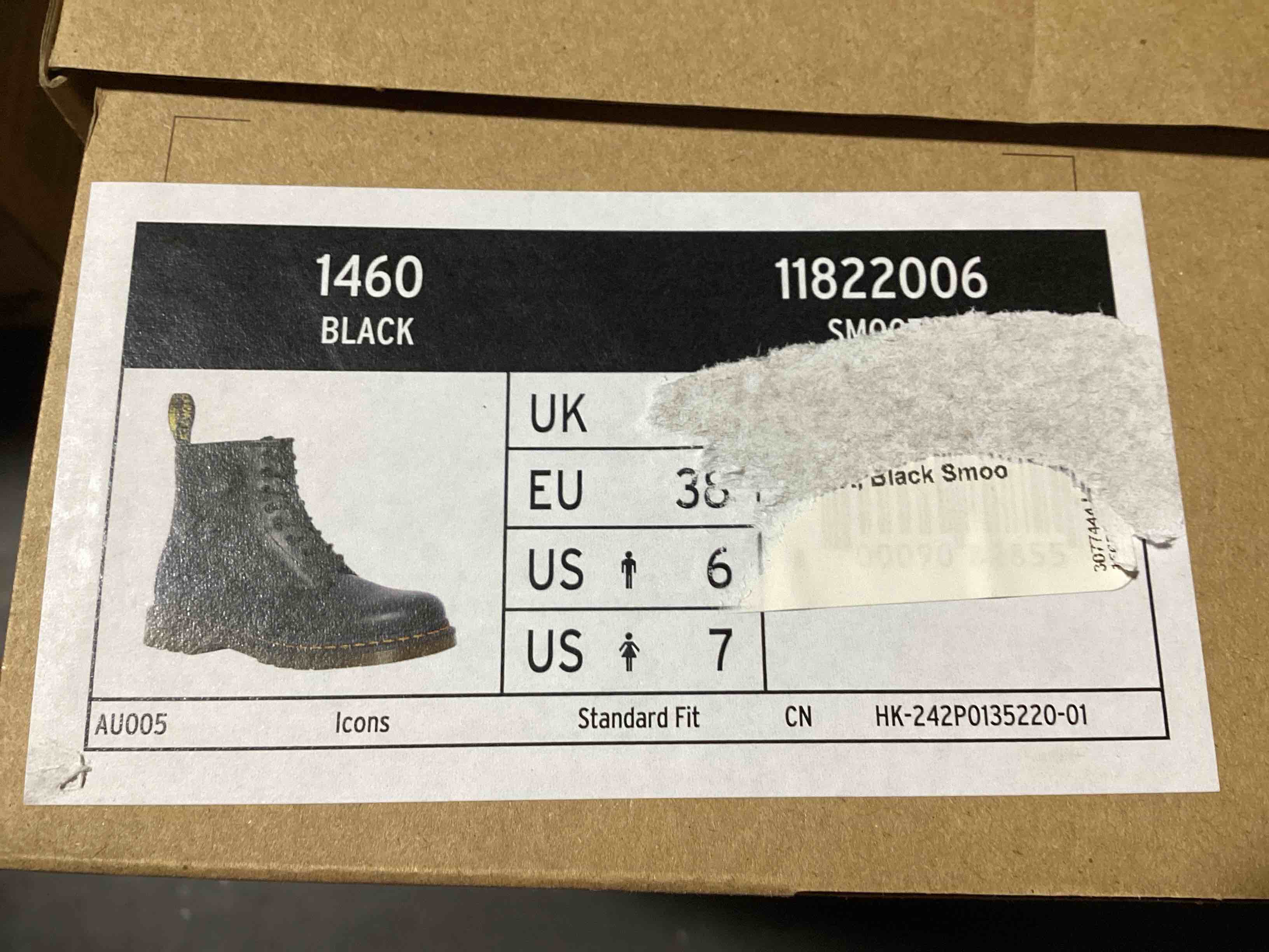 Condition photo showing New/Like New for size 6 men’s/7 womans dr. martens 1460 black smooth leather lace up boots 11822006