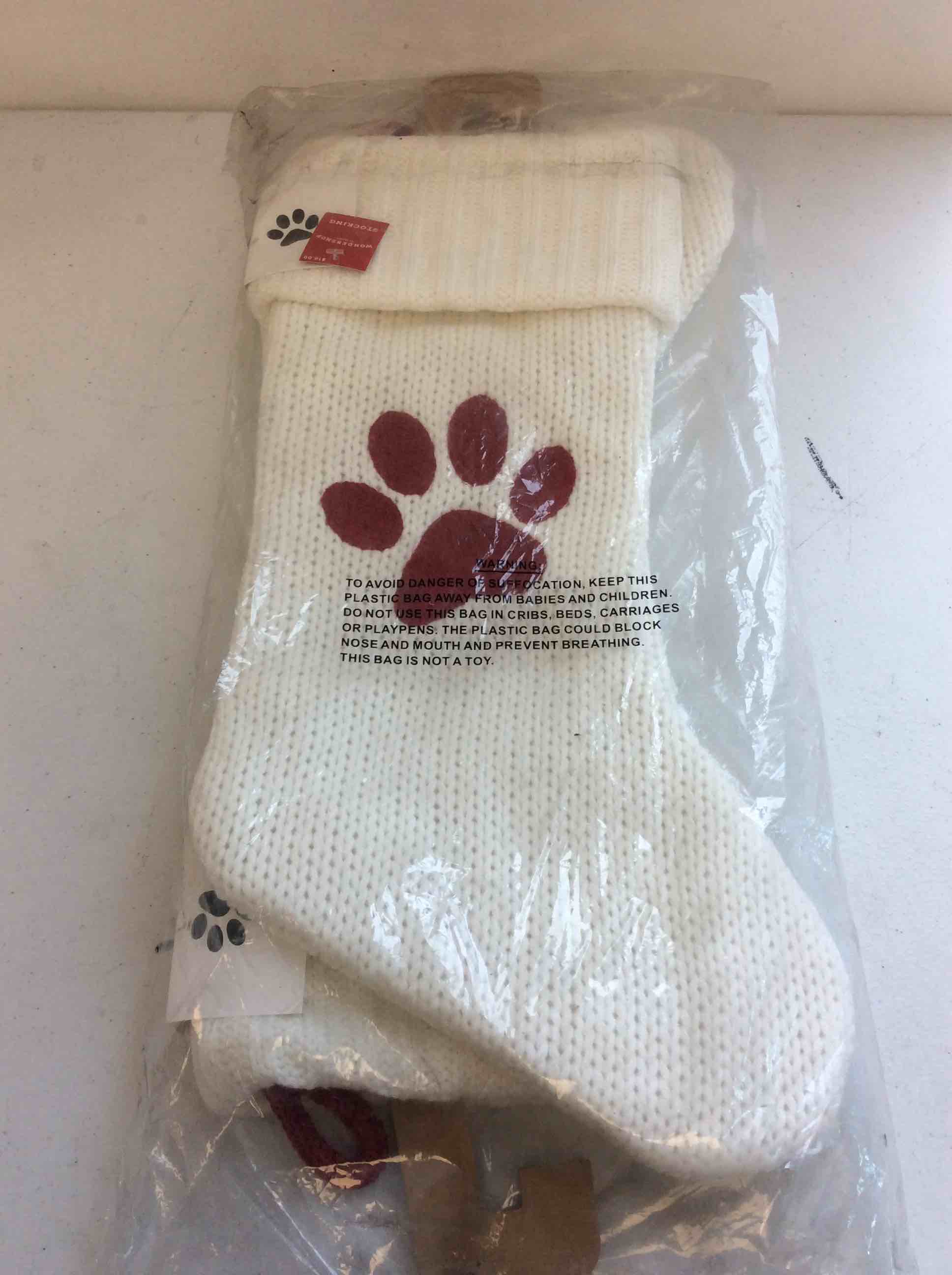 Condition photo showing New/Like New for wondershop decorative large dog stocking 2 pcs