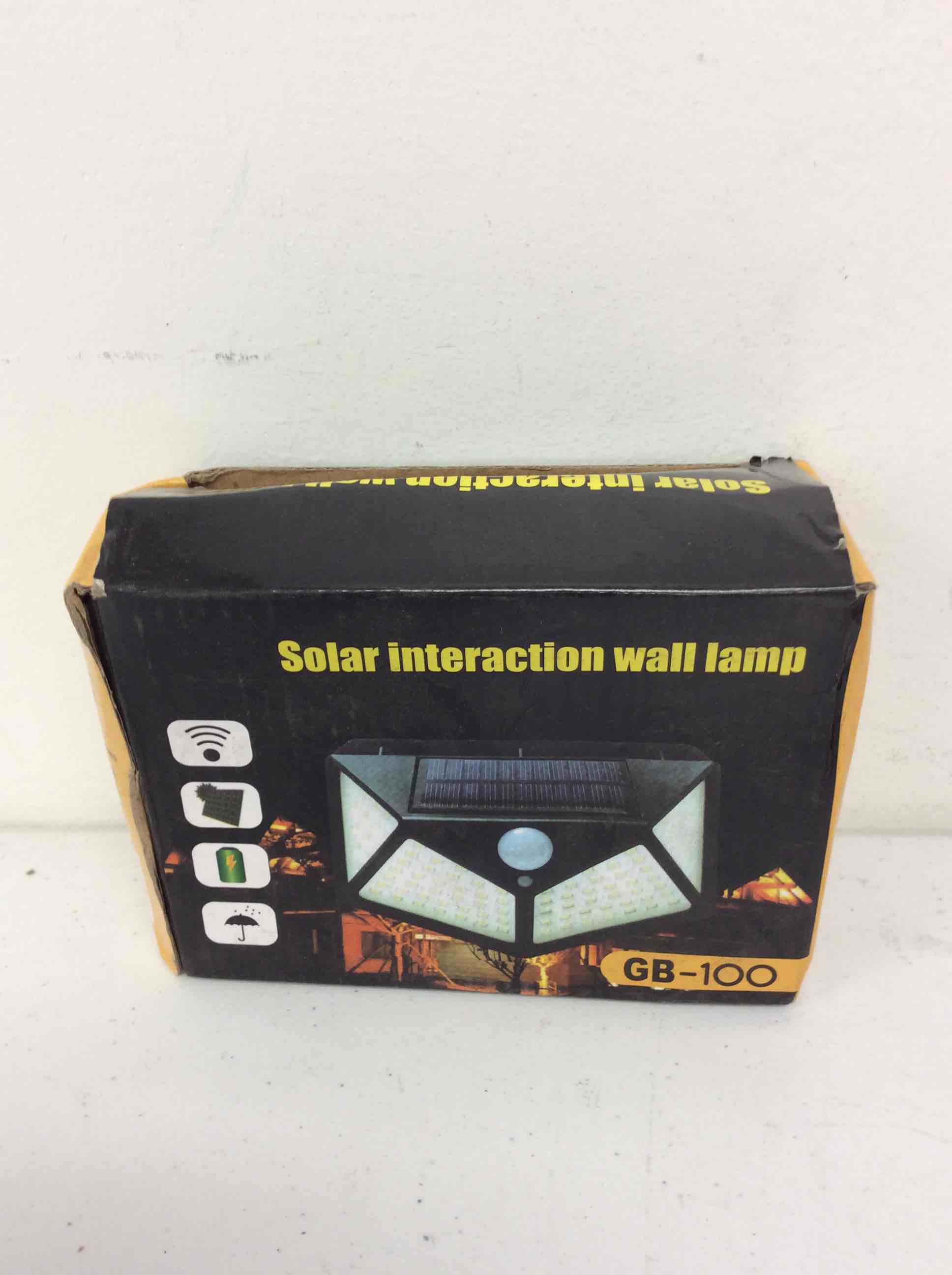 Condition photo showing Good Condition for 1 goeco solar lights outdoor, ip65 waterproof &100 led solar motion sensor lights with 3 lighting modes, solar powered outdoor wall lights for garden, patio, yard, garage, backyard