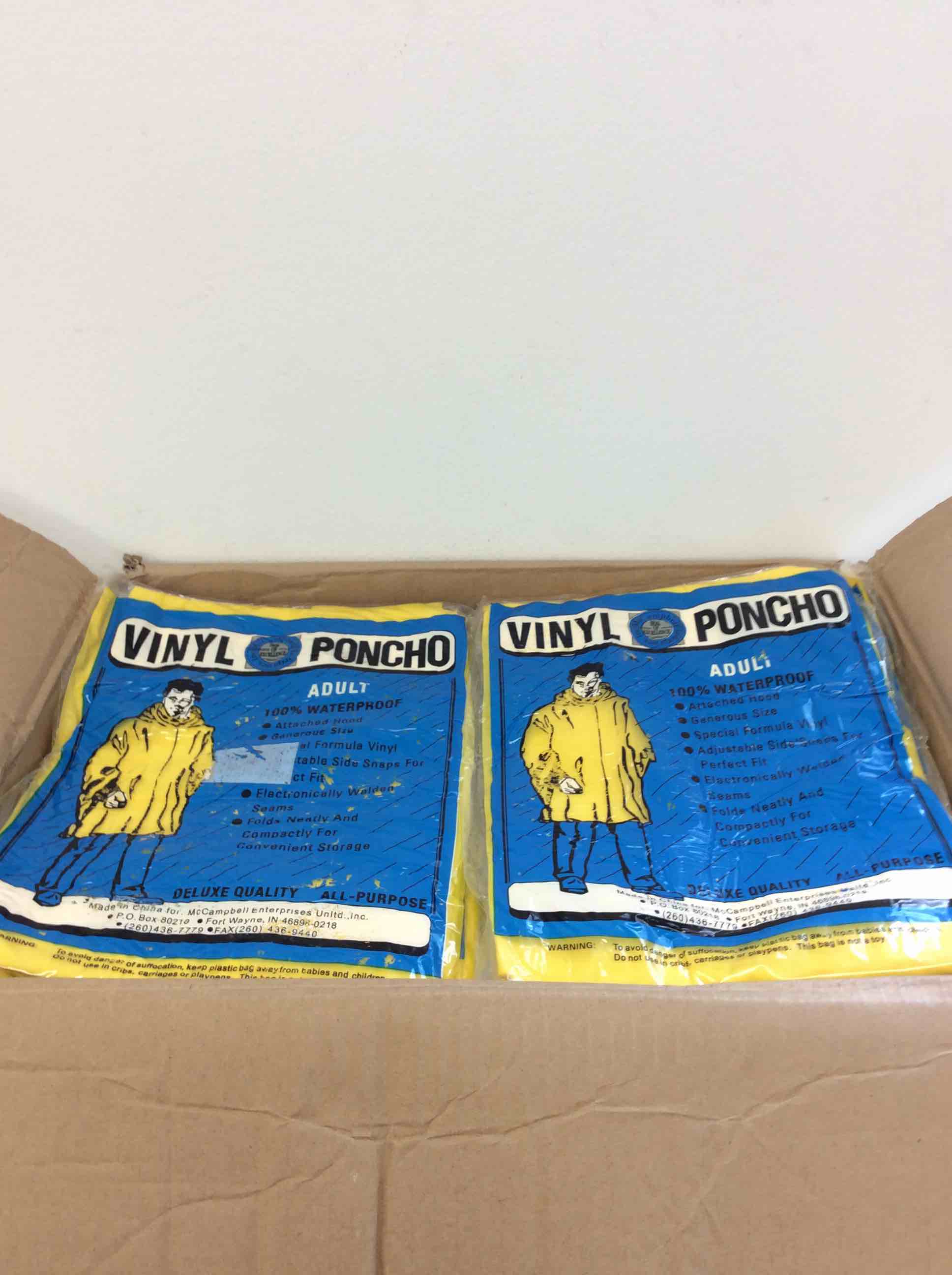 Condition photo showing New/Like New for box of vinyl adult ponchos 100% waterproof in yellow