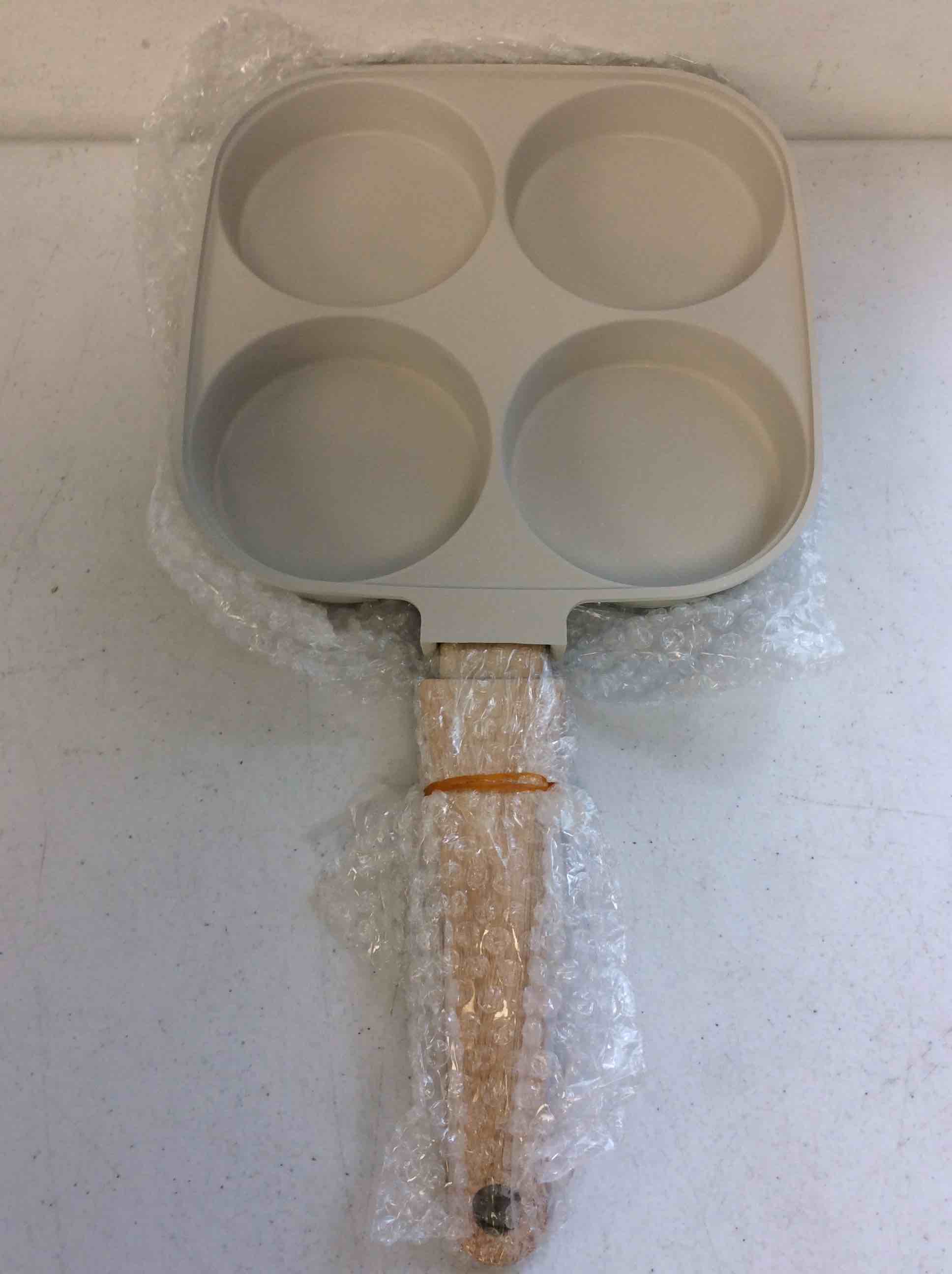 Condition photo showing New/Like New for 4 cup egg pan with wooden handle, non stick aluminum alloy frying pan