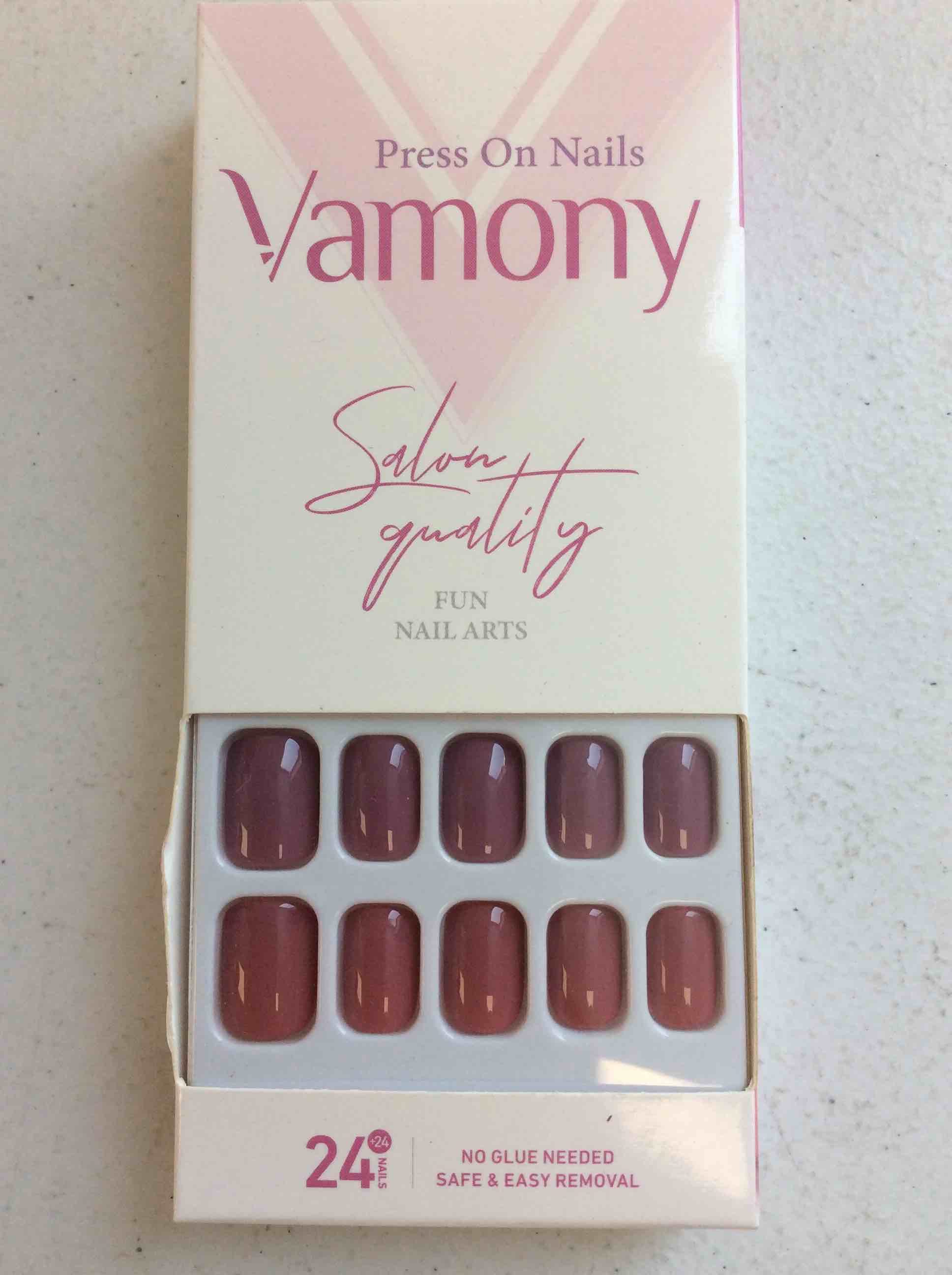 Condition photo showing New/Like New for vamony press on nails kit, includes prep pad, adhesive tabs, mini file, manicure stick, square nails