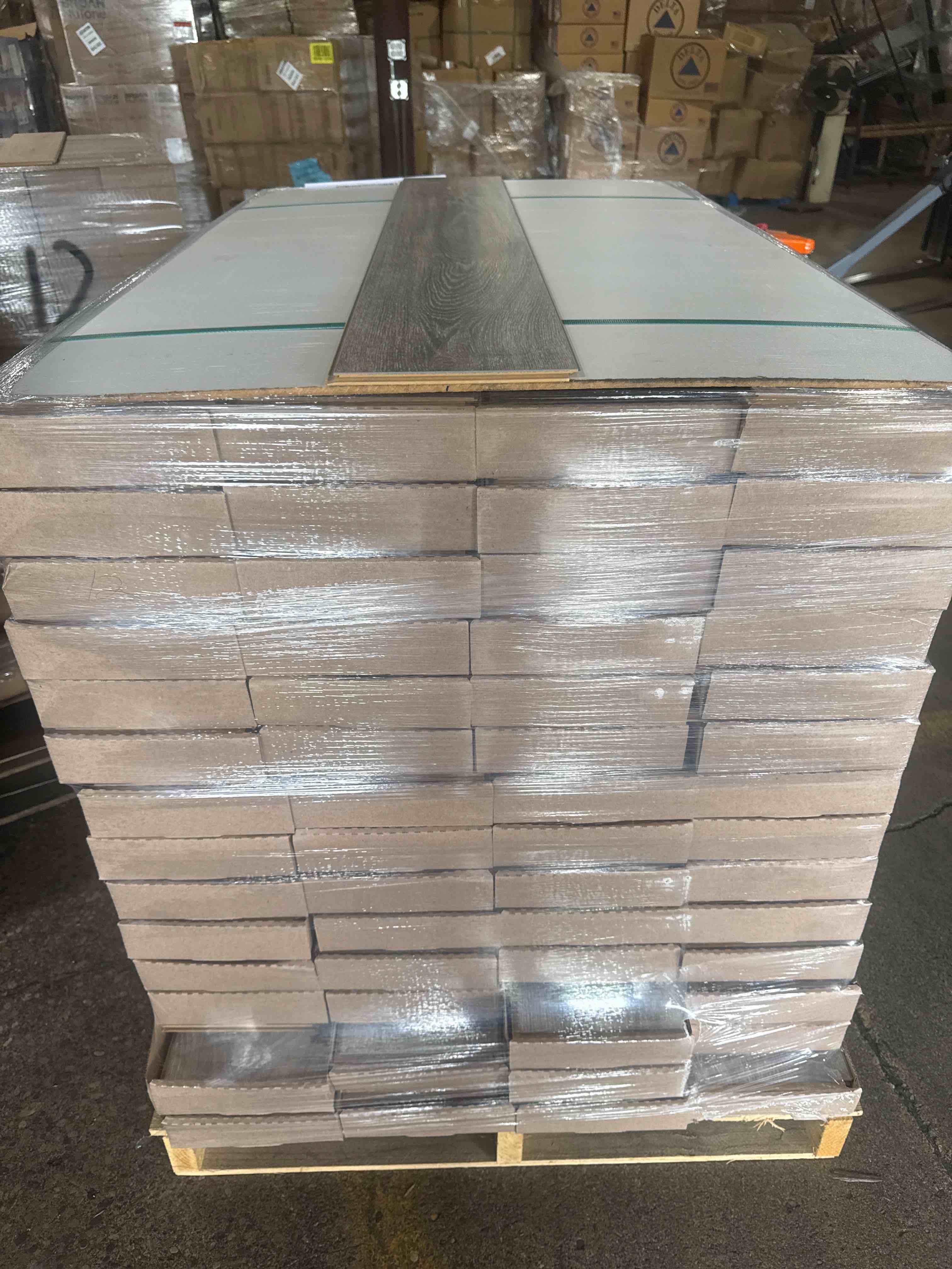 laminate wood flooring 8mm thickness 50.67 inches × 7.48 inches(21.05 sq ft/ box) 56 boxes = 1179 sq ft - bid per sq ft