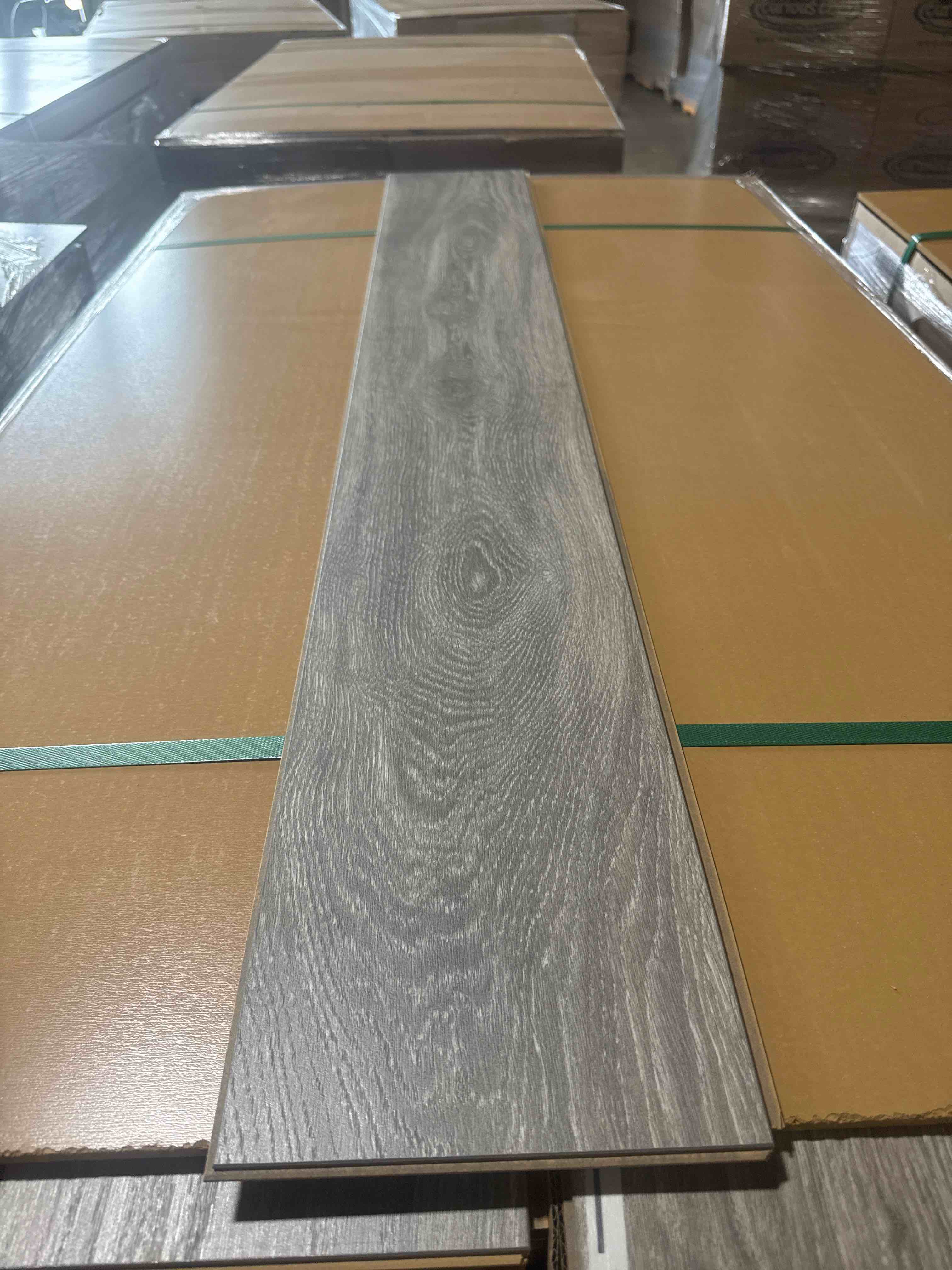 Condition photo showing Good Condition for laminate wood flooring 8mm thickness 50.67 inches × 7.48 inches(21.05 sq ft/ box) 56 boxes = 1179 sq ft - bid per sq ft