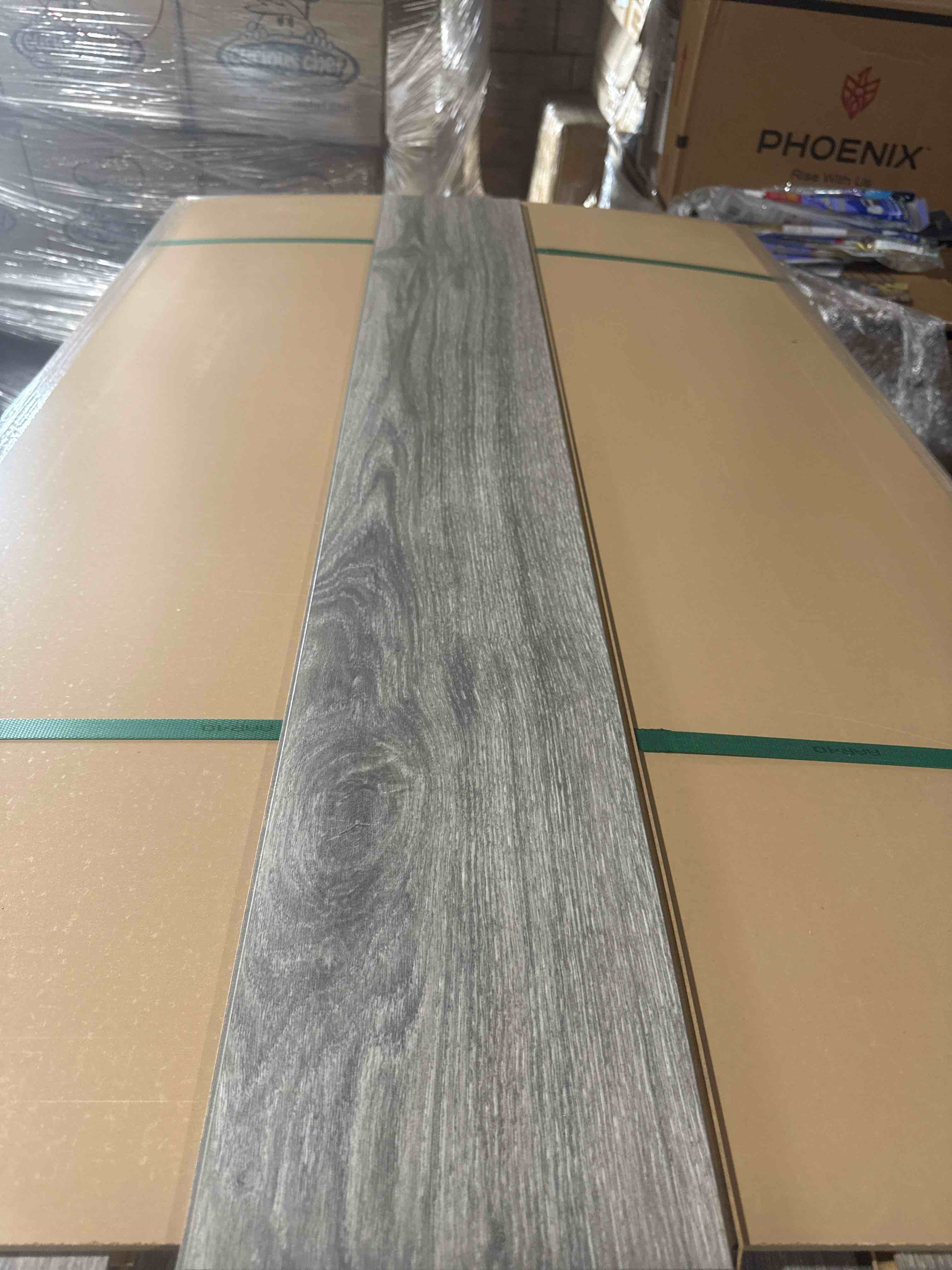 Condition photo showing Good Condition for laminate wood flooring 8mm thickness 50.67 inches × 7.48 inches(21.05 sq ft/ box) 56 boxes = 1179 sq ft - bid per sq ft