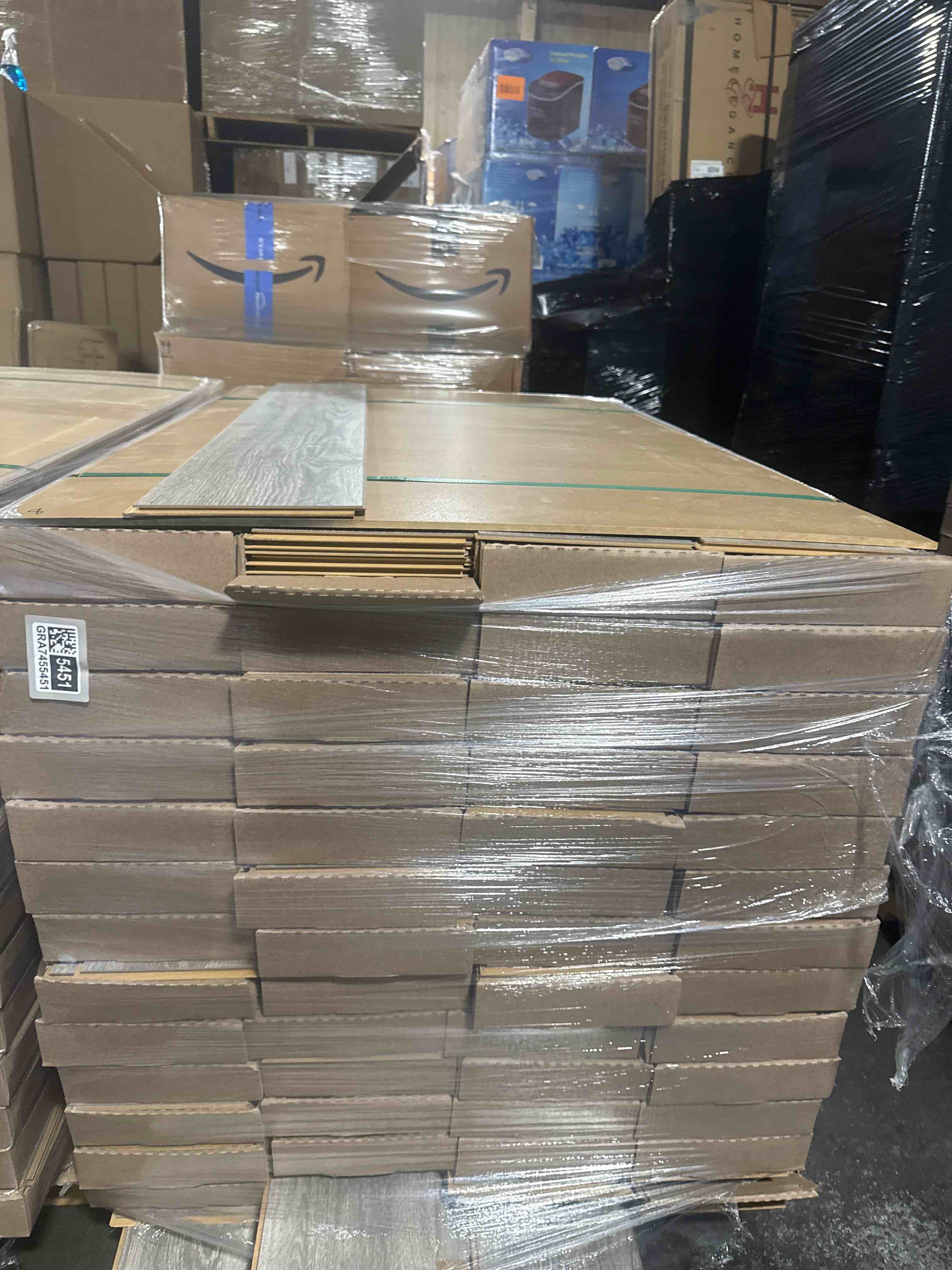 laminate wood flooring 8mm thickness 50.67 inches × 7.48 inches(21.05 sq ft/ box) 56 boxes = 1179 sq ft - bid per sq ft