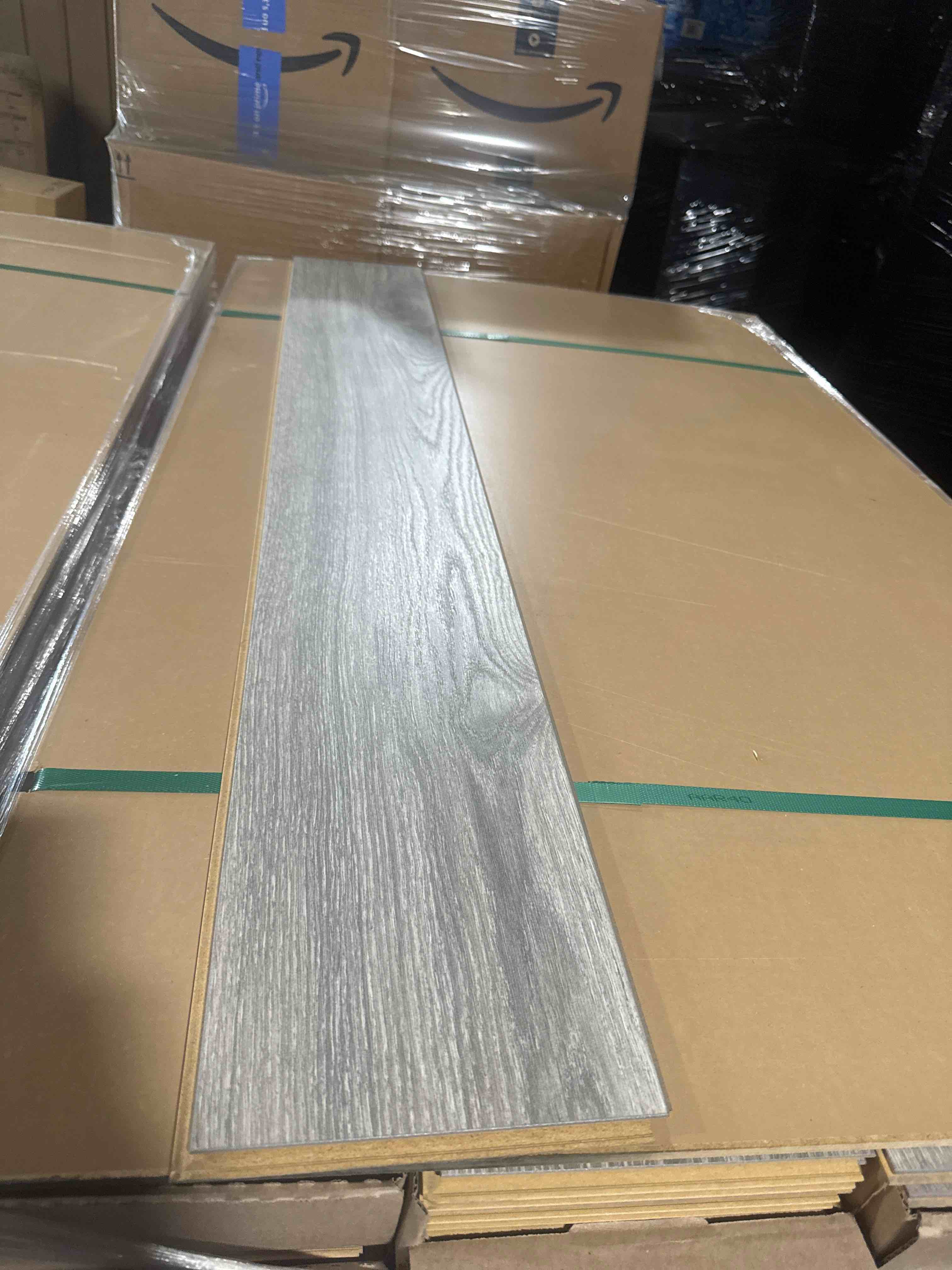 Condition photo showing Good Condition for laminate wood flooring 8mm thickness 50.67 inches × 7.48 inches(21.05 sq ft/ box) 56 boxes = 1179 sq ft - bid per sq ft