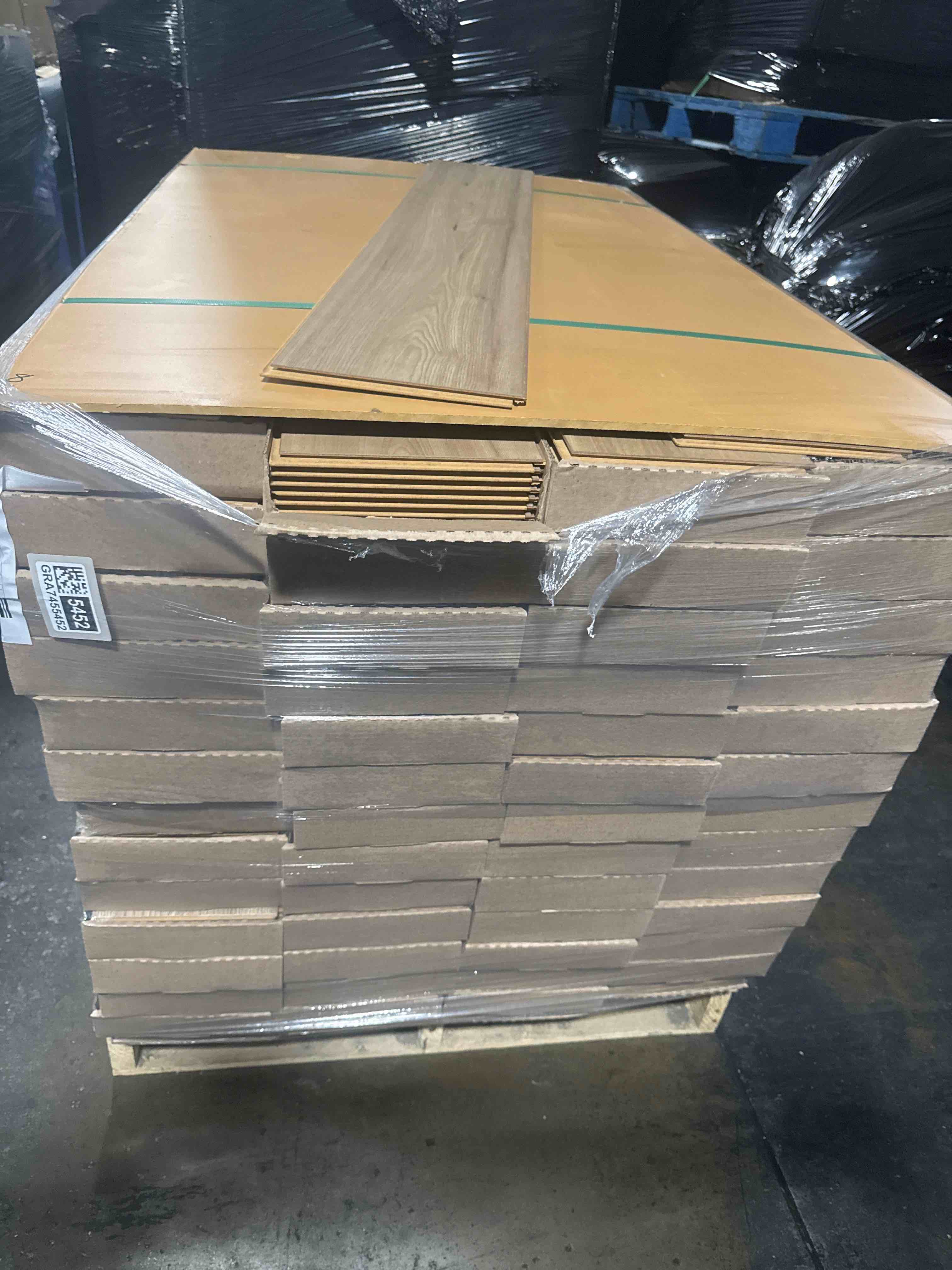 laminate wood flooring 8mm thickness 50.67 inches × 7.48 inches(21.05 sq ft/ box) 56 boxes = 1179 sq ft - bid per sq ft