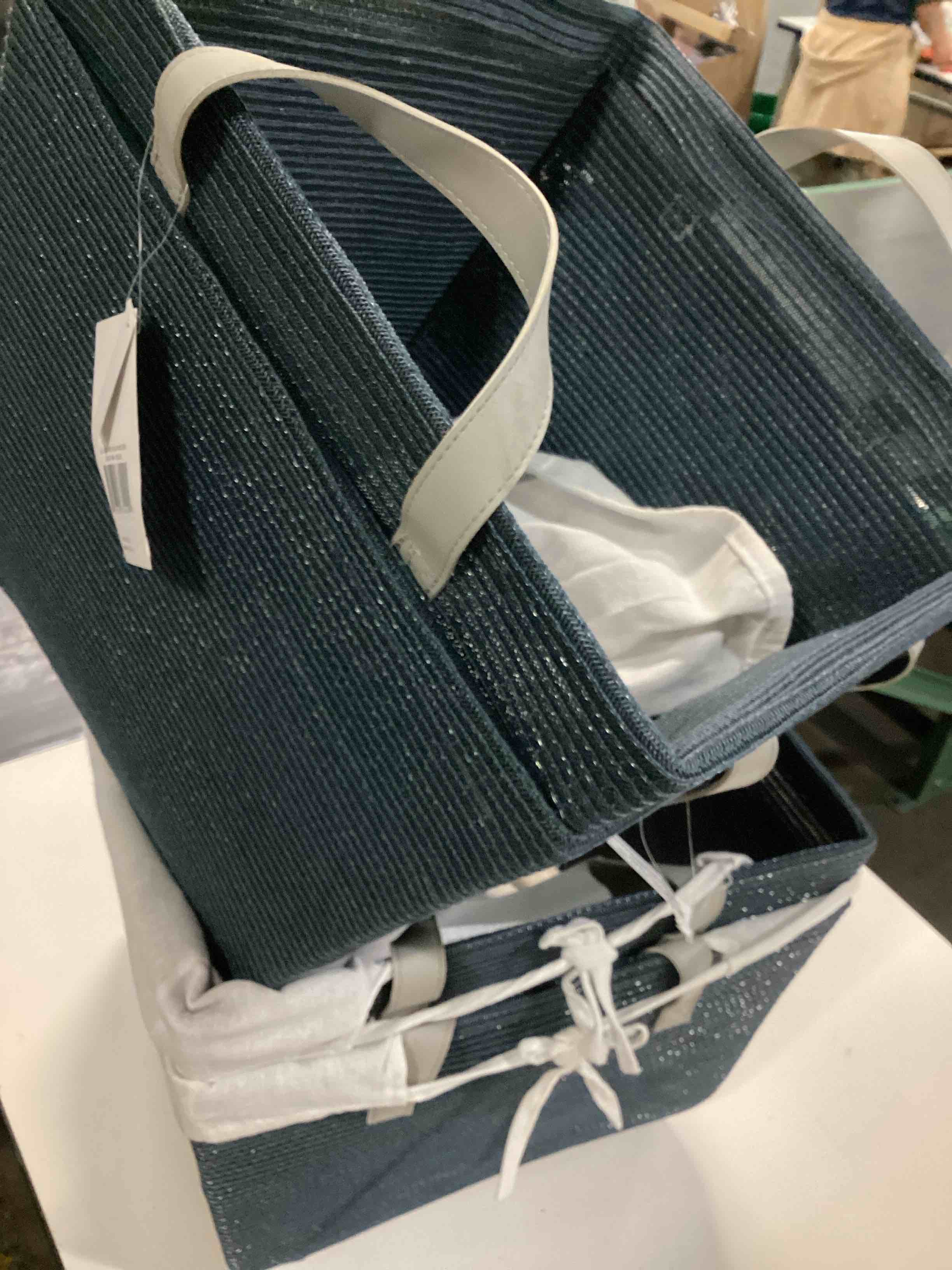 Condition photo showing Good Condition for baum essex faux wicker storage bins 3-pack, foldable storage baskets for organizing toys, books, shelves, closet, large storage box with rope handles, sturdy organizer bins, white & blue