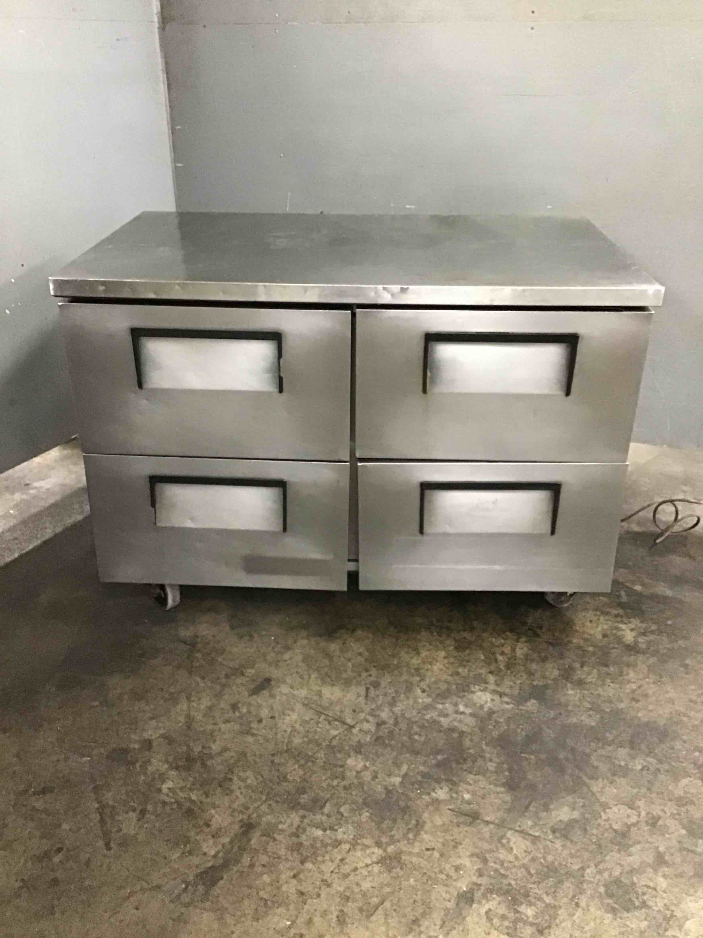 TRUE 48 INCH STAINLESS STEEL 4-DRAWER WORKTOP REFRIGERATOR ON CASTERS