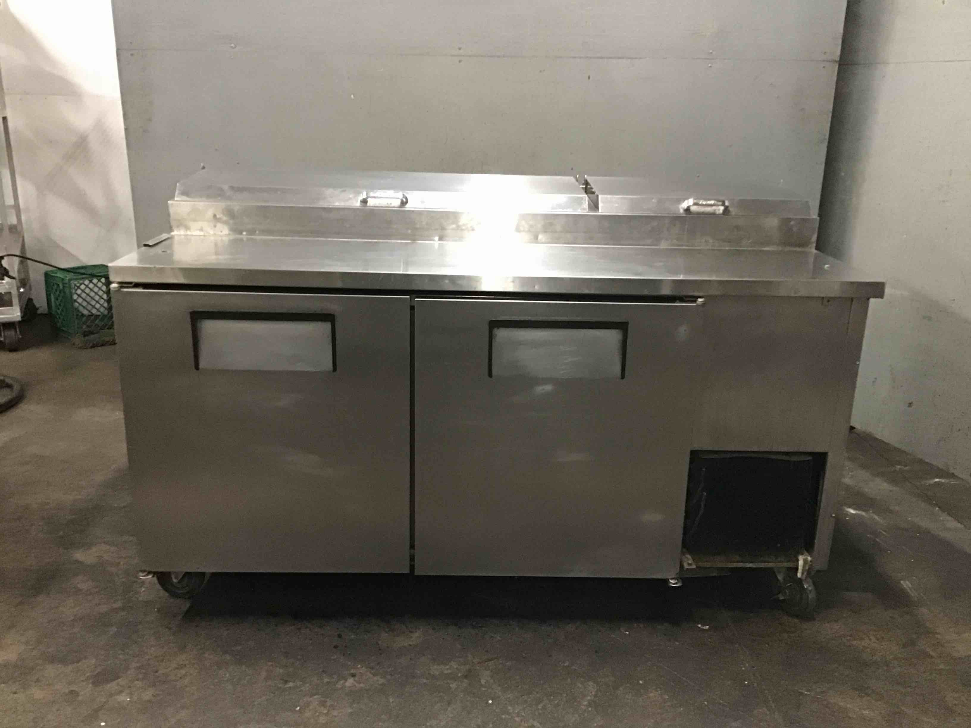 True Stainless Steel 67.25 Inch 2 Door TPP-67 Refrigerated Pizza Prep Table On Casters 