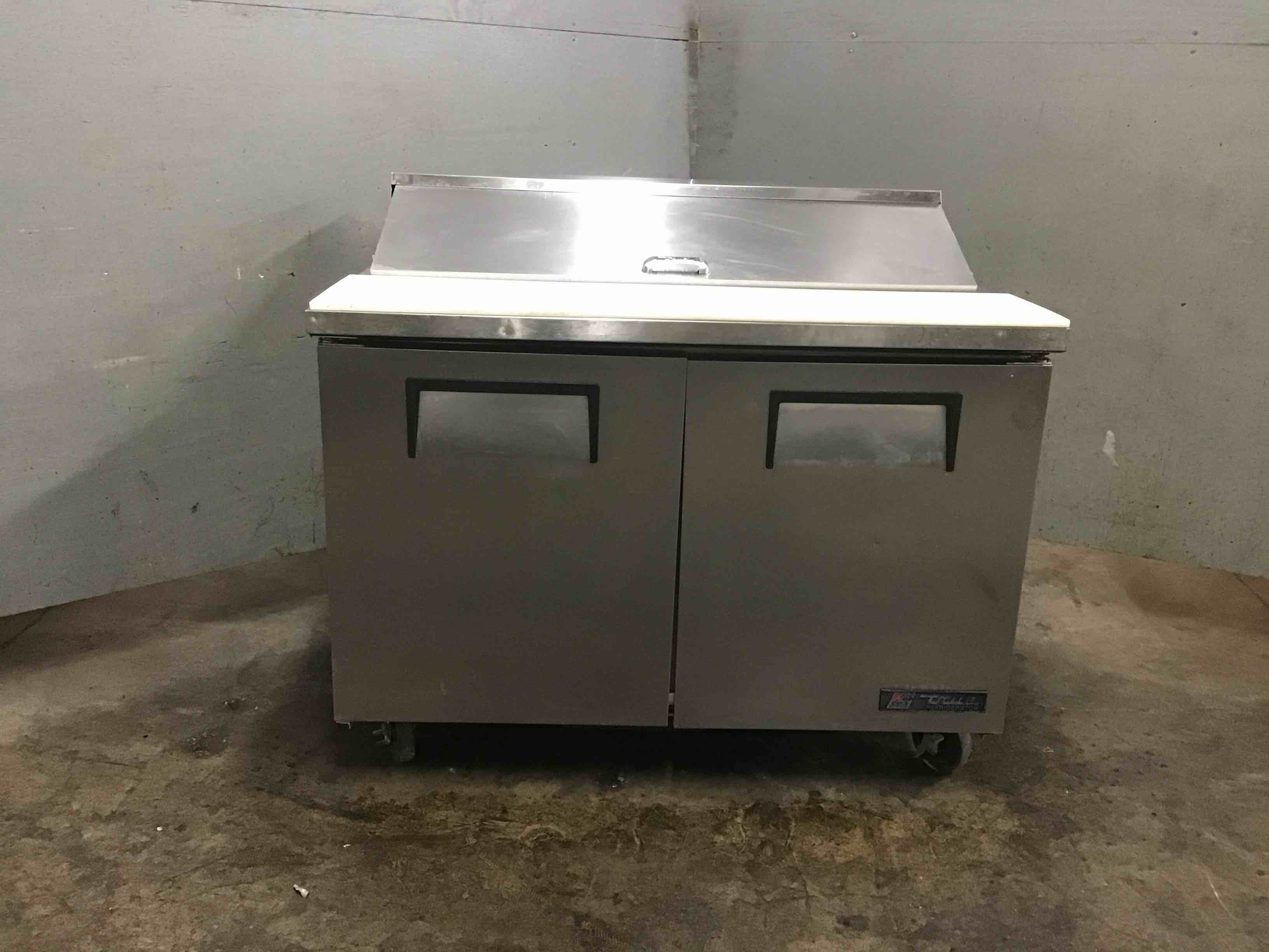 True Stainless Steel 48 Inch 2 Door Refrigerated Mega Top Sandwich Prep Table On Casters 