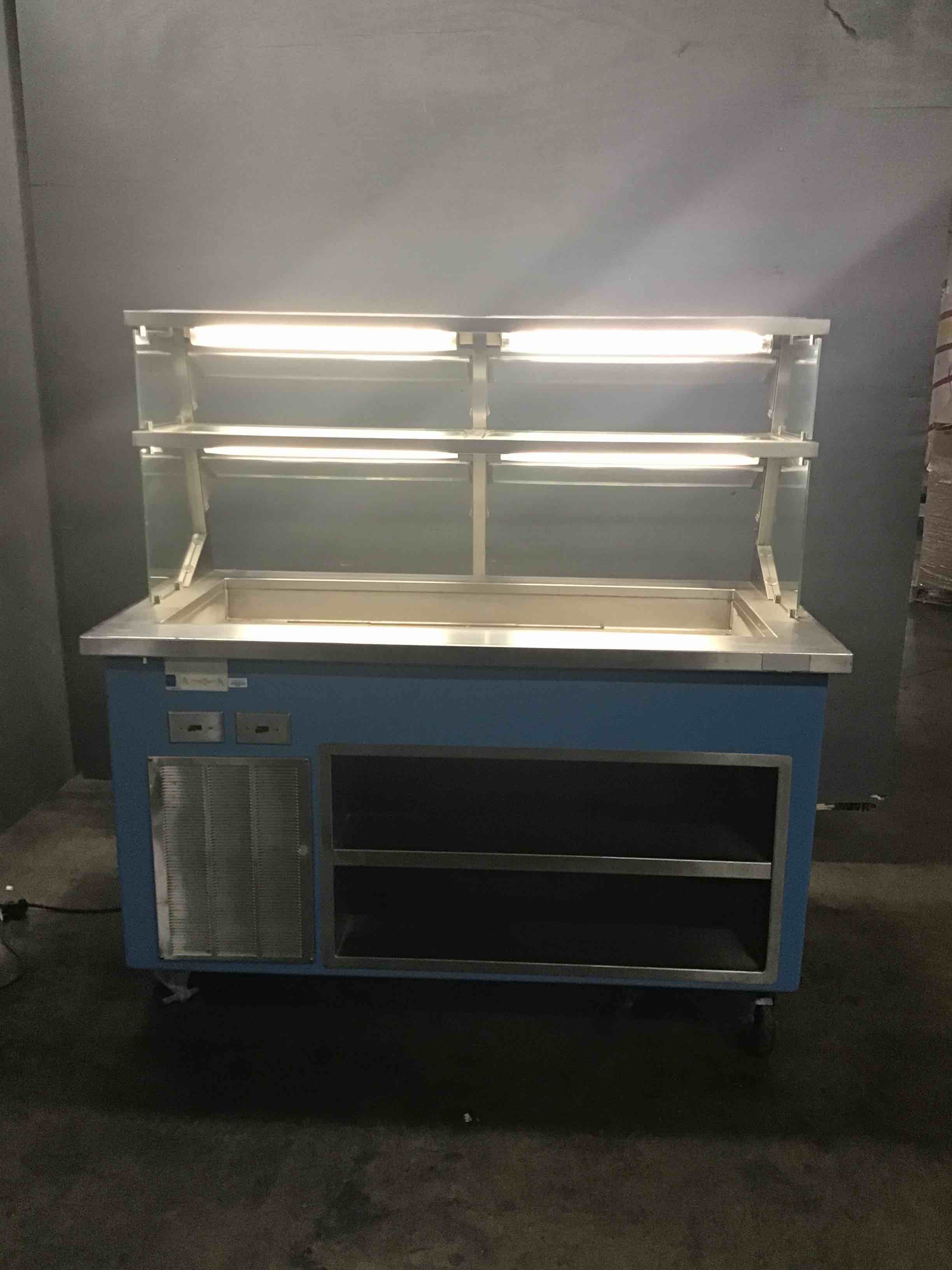 Shelley Glass 60 Inch Stainless Steel KCSC-60-NU Cold Food Serving Counter With Sneeze Guards, Top Shelves And Under Shelves On Casters