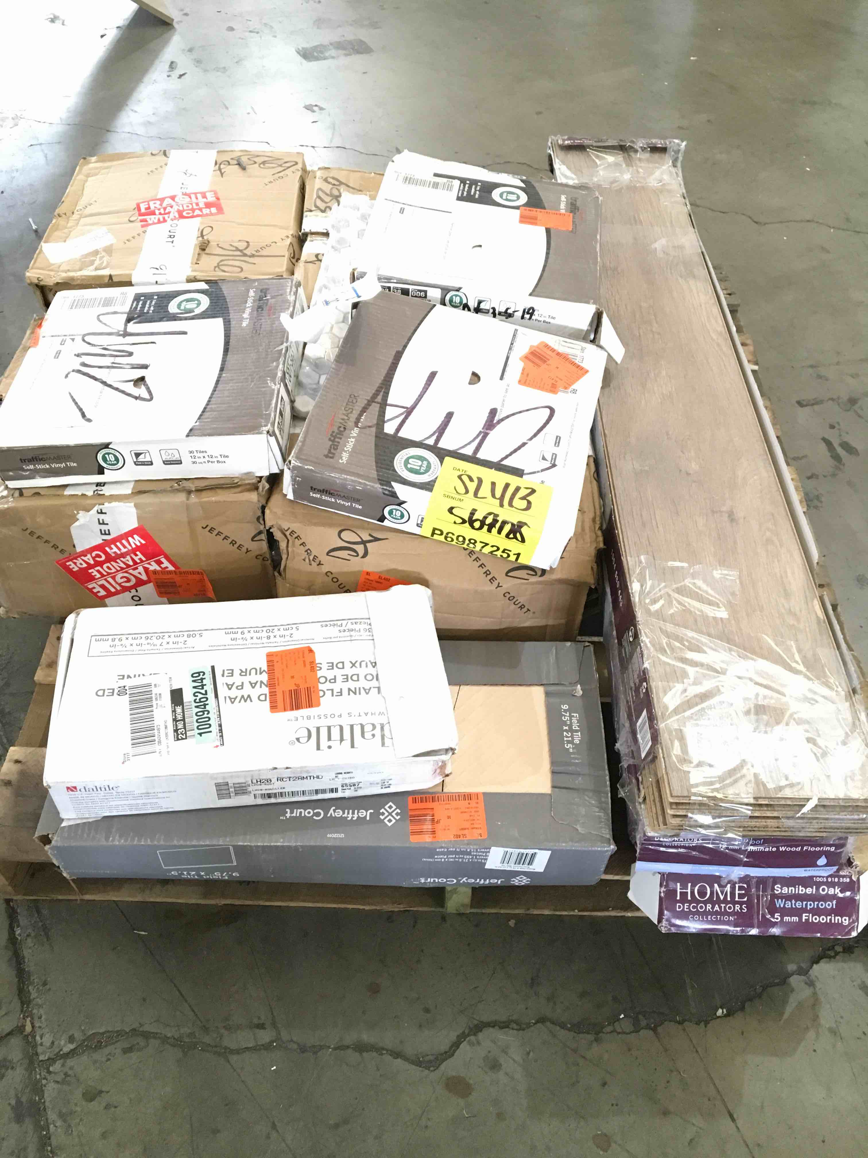 Assorted Skid of Porcelain, Ceramic Floor/Wall Tile, Vinyl Flooring Planks, Peel and Stick Vinyl Tile. 12 Boxes Total. Your Bid Per Box.