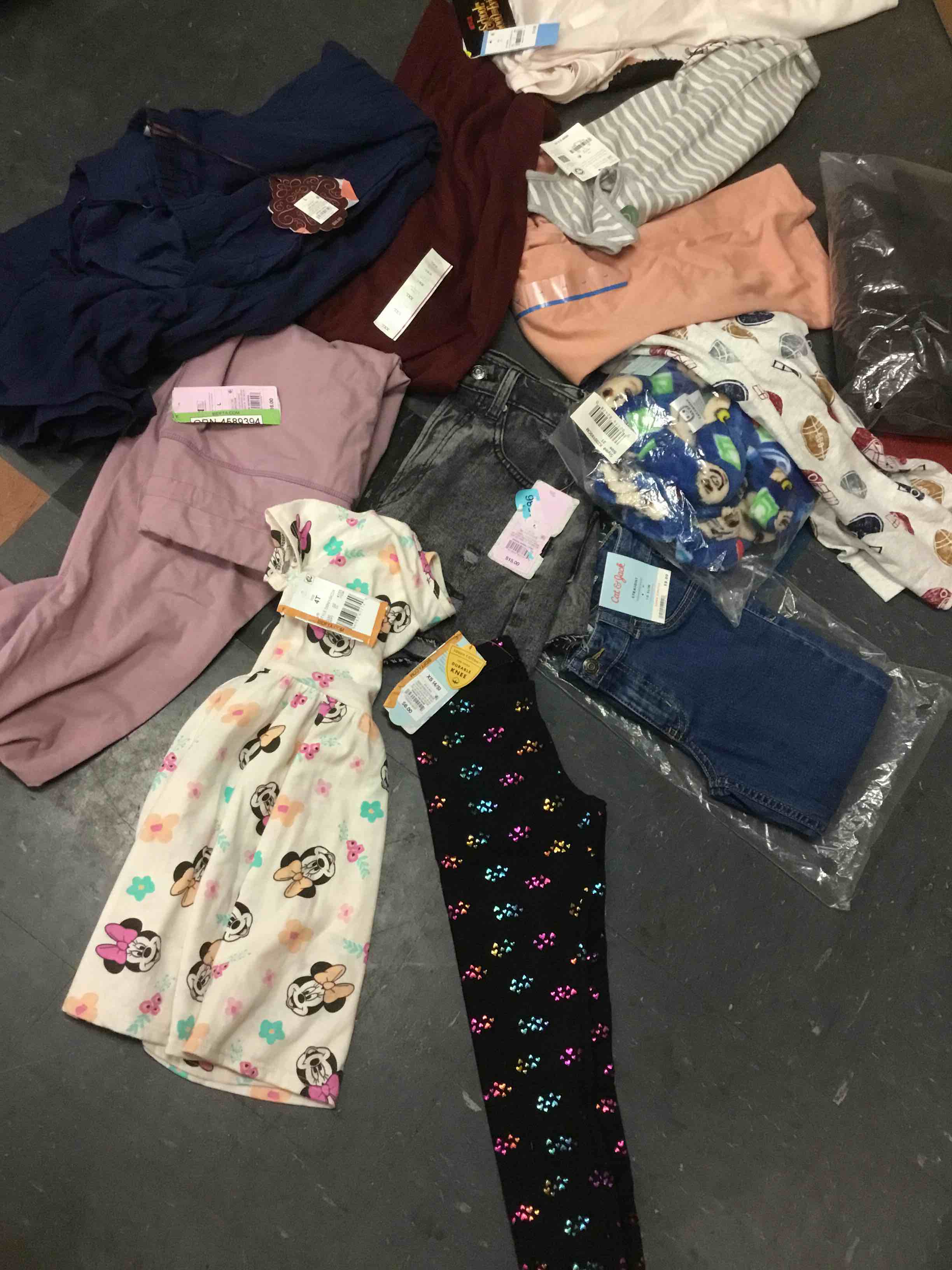 assorted miscellaneous clothes the different sizes 