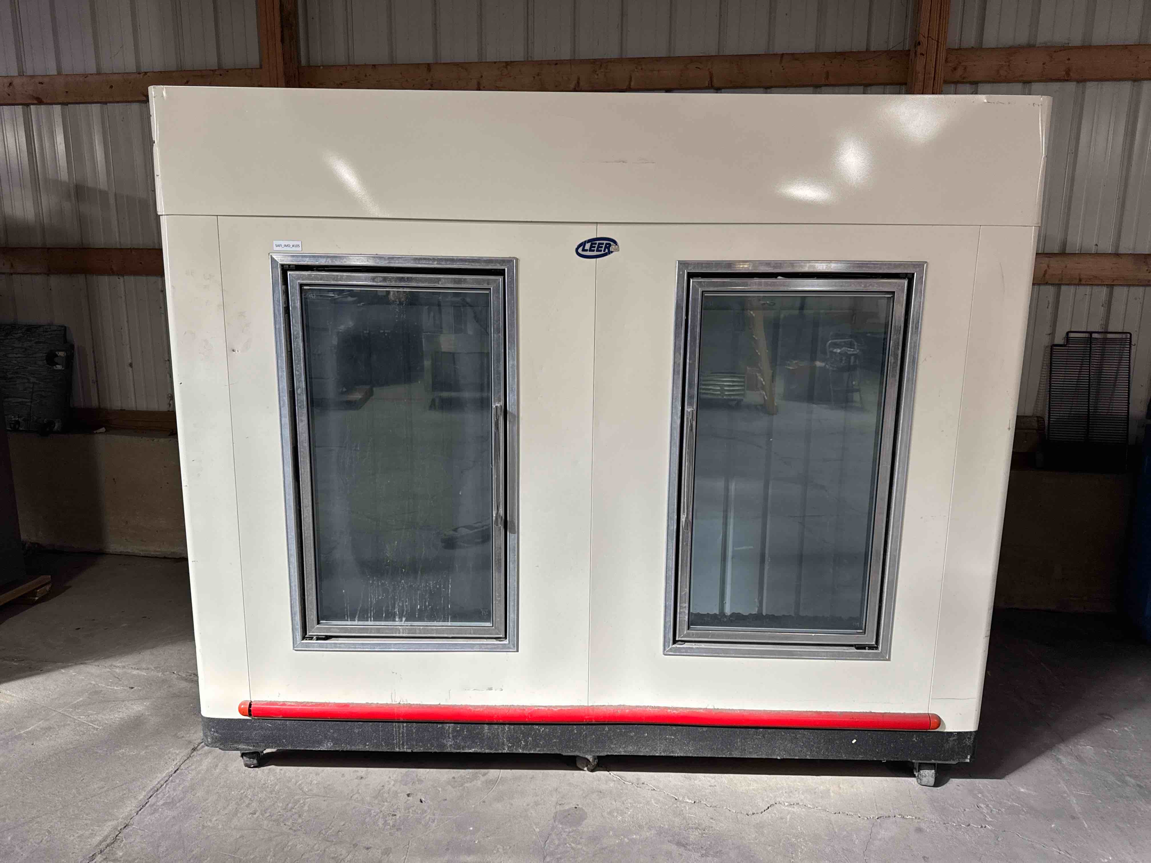LEER 94 INCH TWO GLASS DOOR BAGGED ICE FREEZER MERCHANDISER ON CASTERS