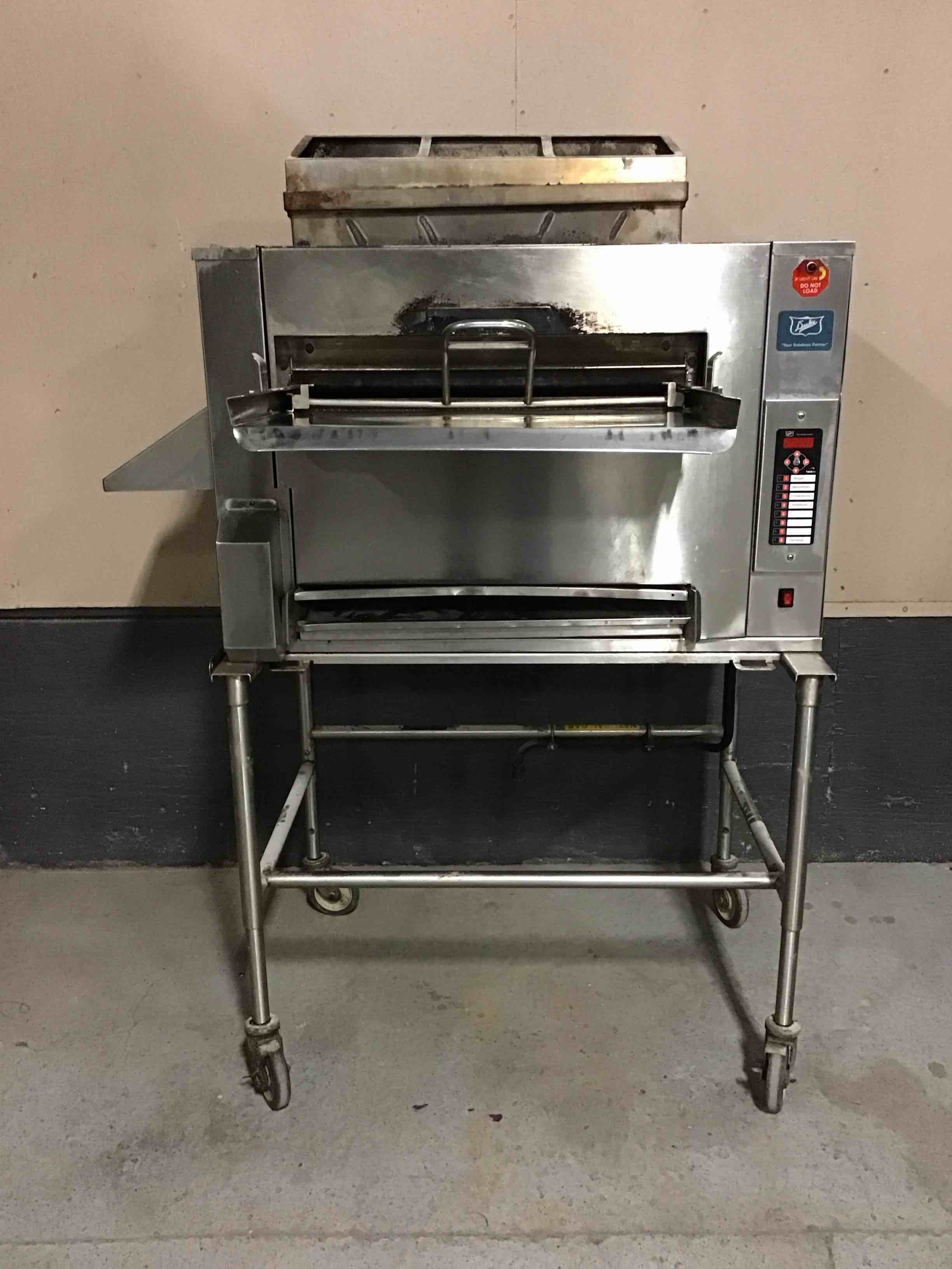 2016 DUKE NATURAL GAS BROILER ON EQUIPMENT STAND WITH CASTERS 