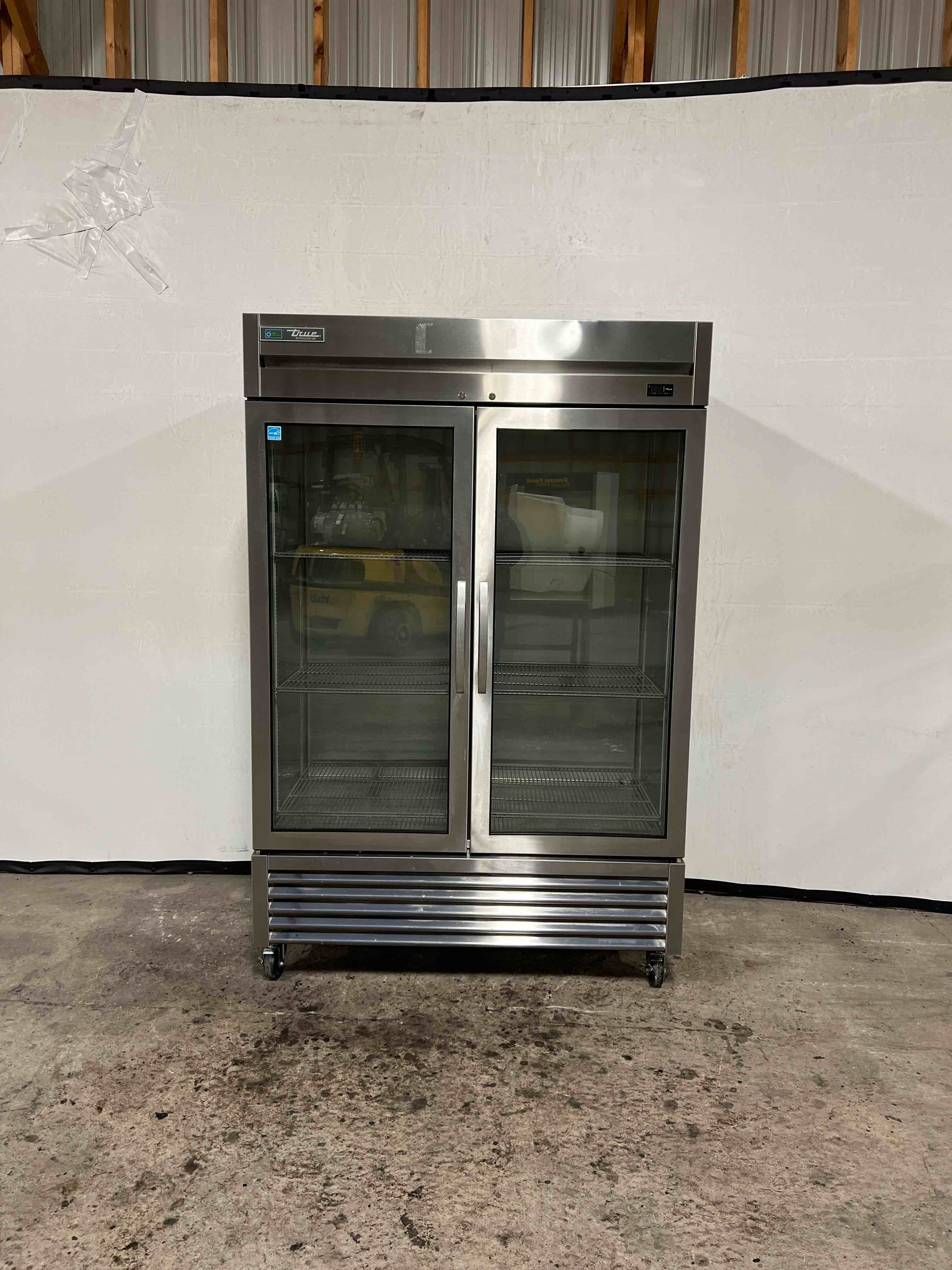 2020 TRUE TWO GLASS DOOR REFRIGERATED MERCHANDISER ON CASTERS