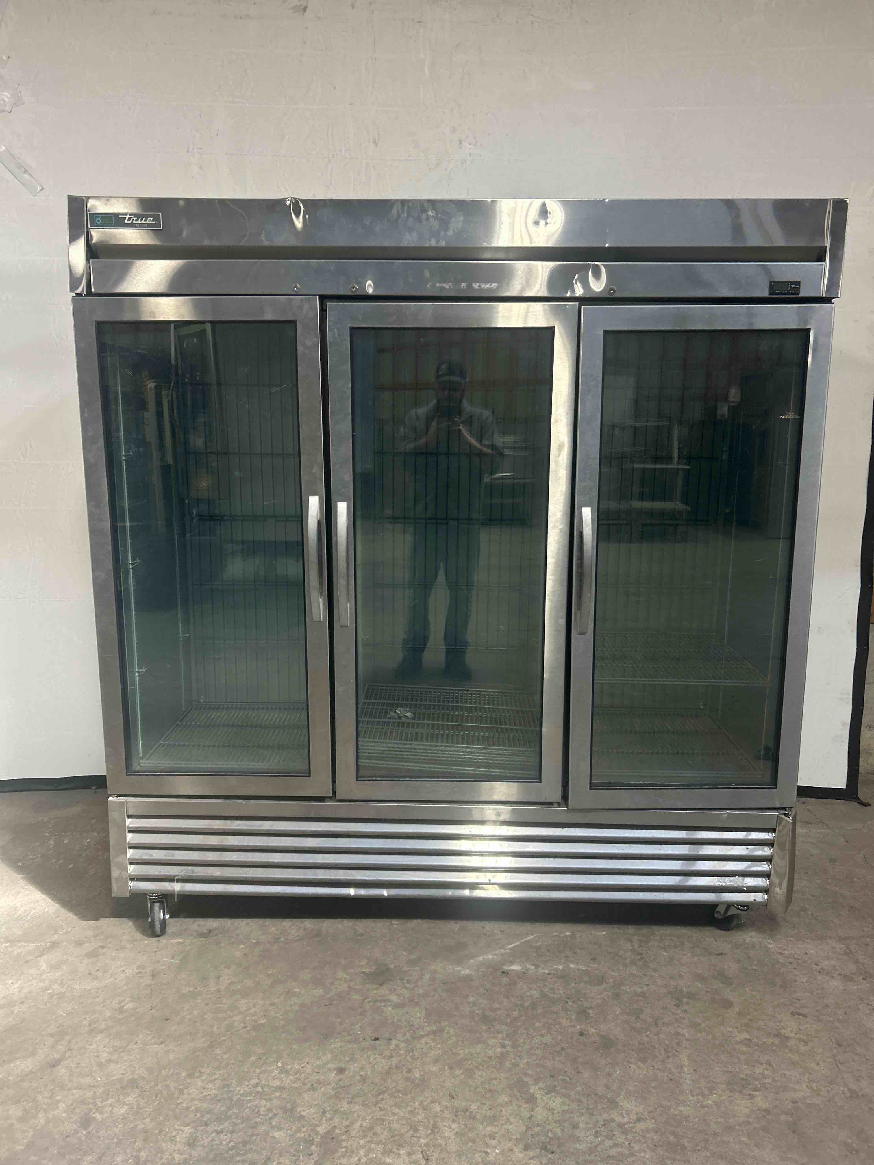2020 TRUE TRIPLE GLASS DOOR FREEZER ON CASTERS