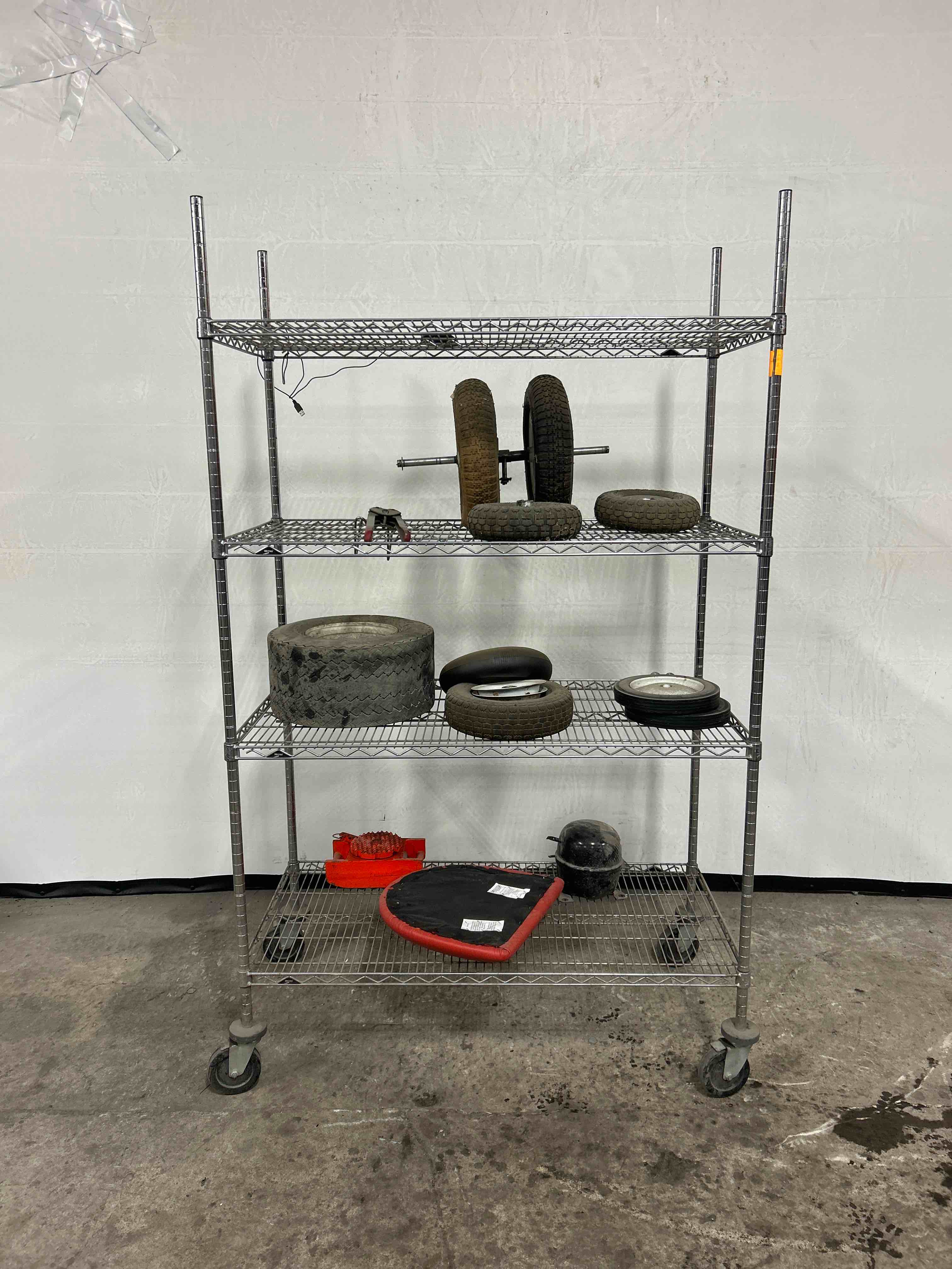 48x24x80 INCH 4 TIER RACK WITH CONTENTS ON CASTERS